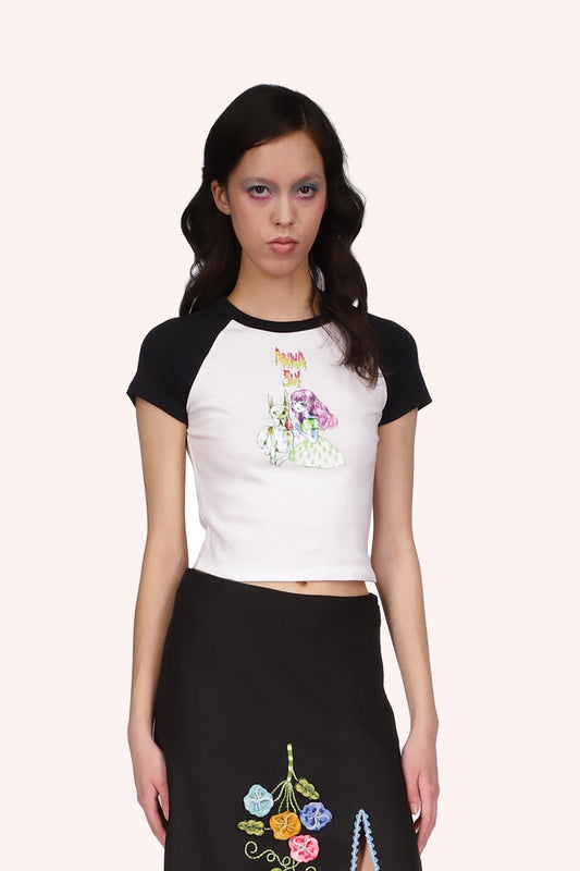 Short-sleeved B&W, above the hips, Anna Sui logo above a stylized little girl with a large white dog