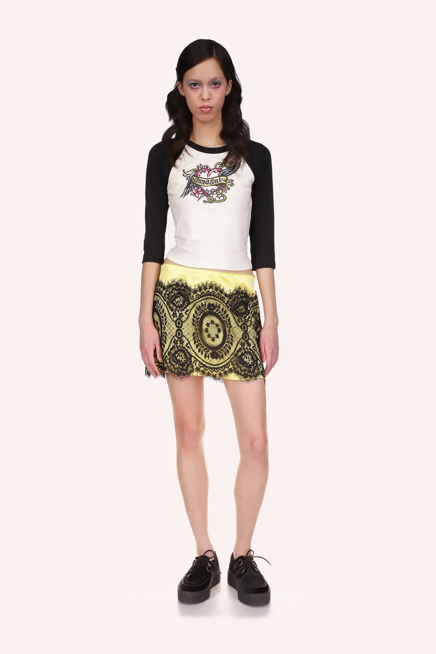  Cropped Tee, black Three Quarter Sleeve, with an heart with wings, floral design and Anna Sui on a banner on white