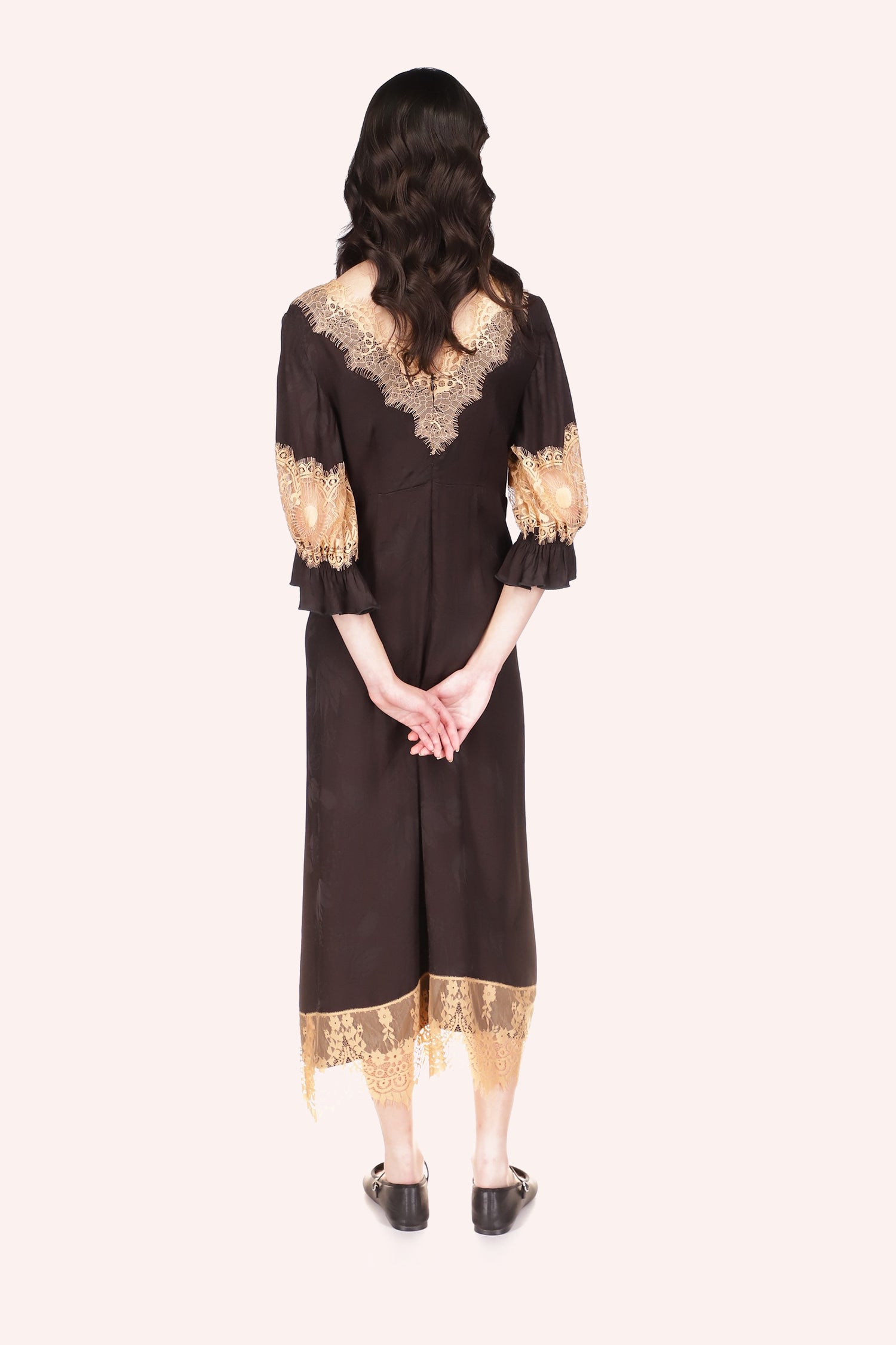 Dress Black, V-cut collar back, beige lace at all hems and mid-arm, ruffle like effect ends of sleeves