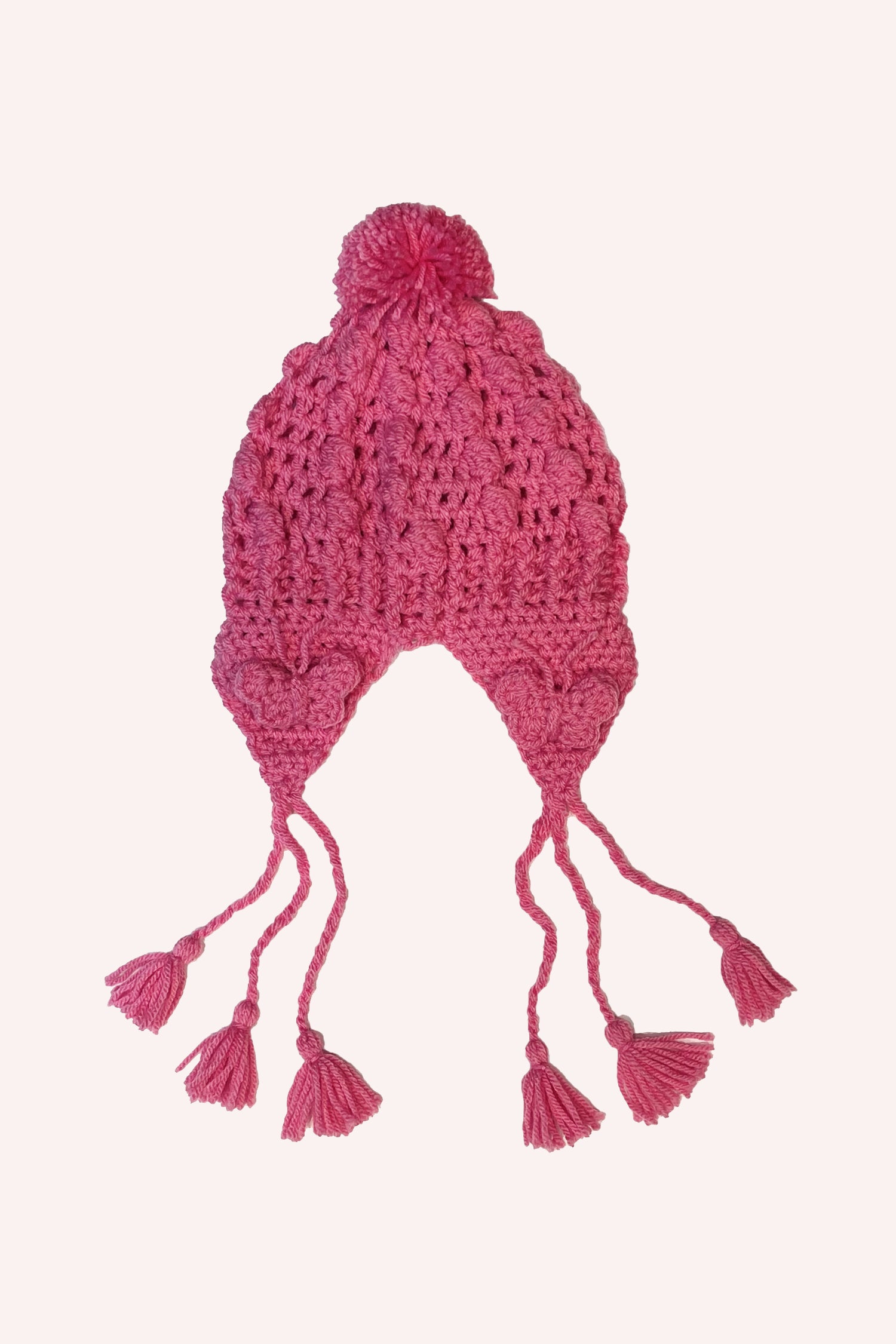 Medium crochet Hat rose, butterfly-shaped ear flaps, 3 strings on each side, bobbles at the ends