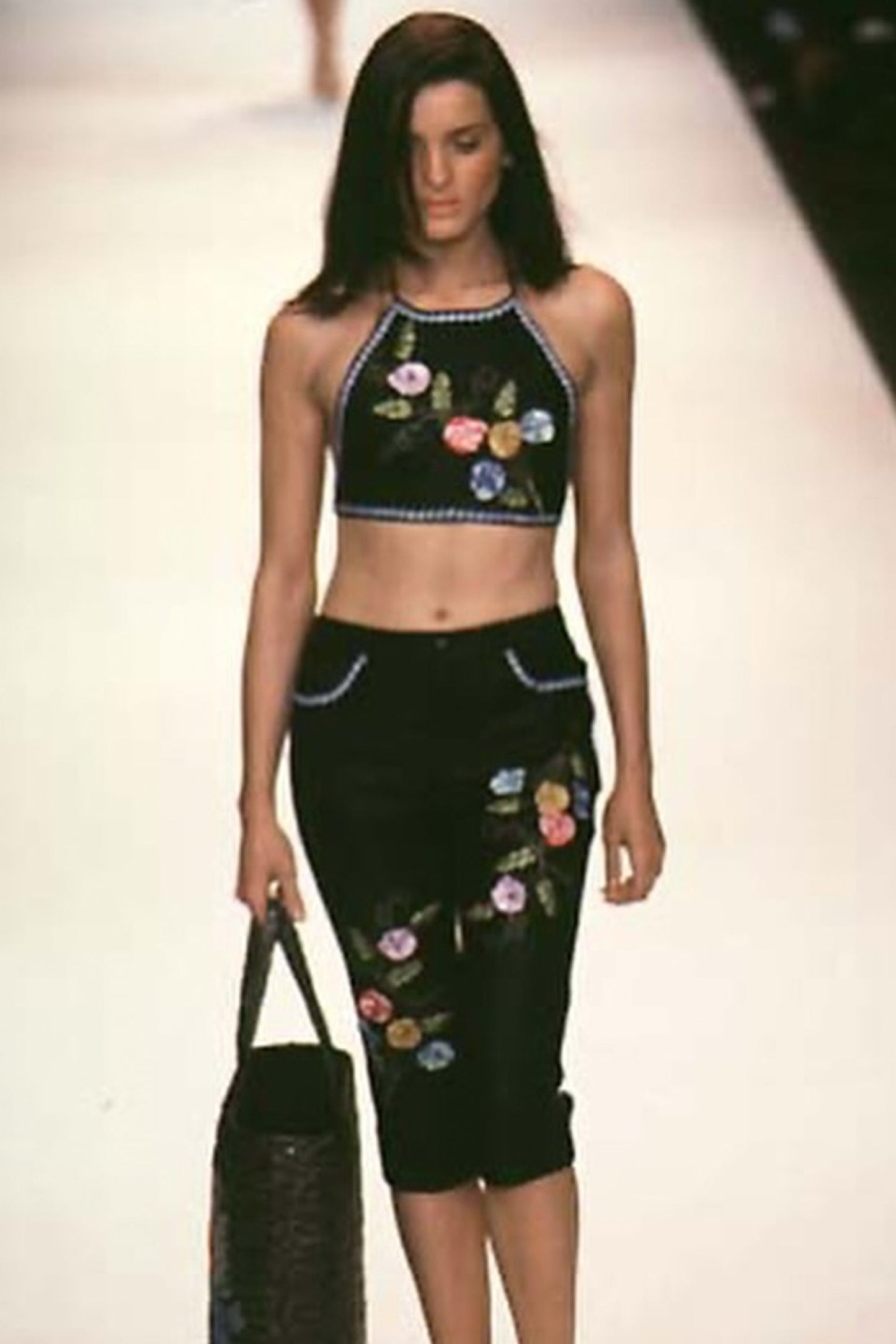 Under runway lights, 3-D Pansy Embroidered on Linen Skirt, baby blue hem, bouquets design on front