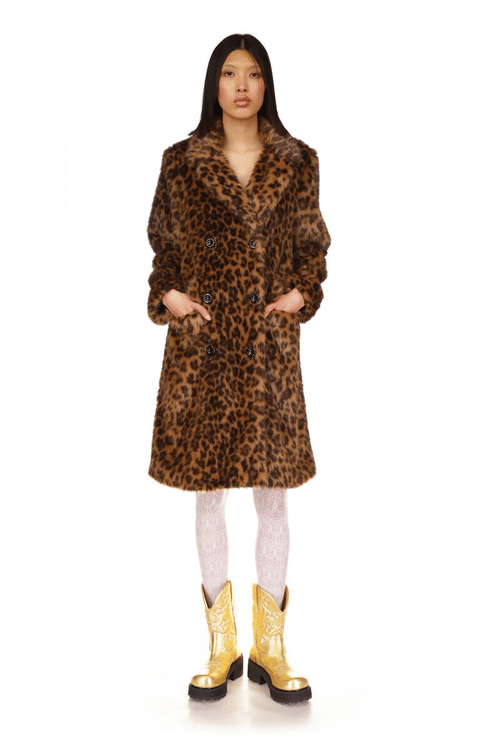 Anna Sui's double-breasted coat features a leopard pattern in shades of brown, from dark to light, also has two flap pockets