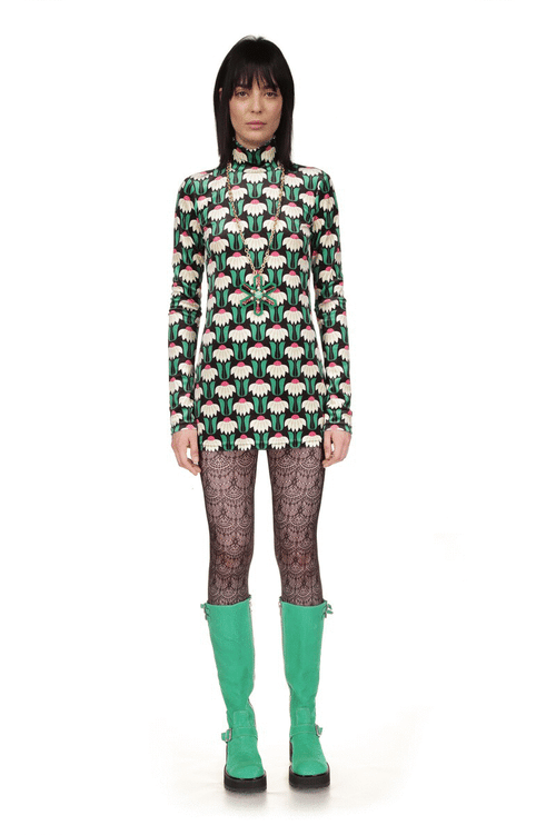 Mini dress, long sleeve, turtleneck, black with pattern of white daisies, pink hearts, green leaves, zipper on back