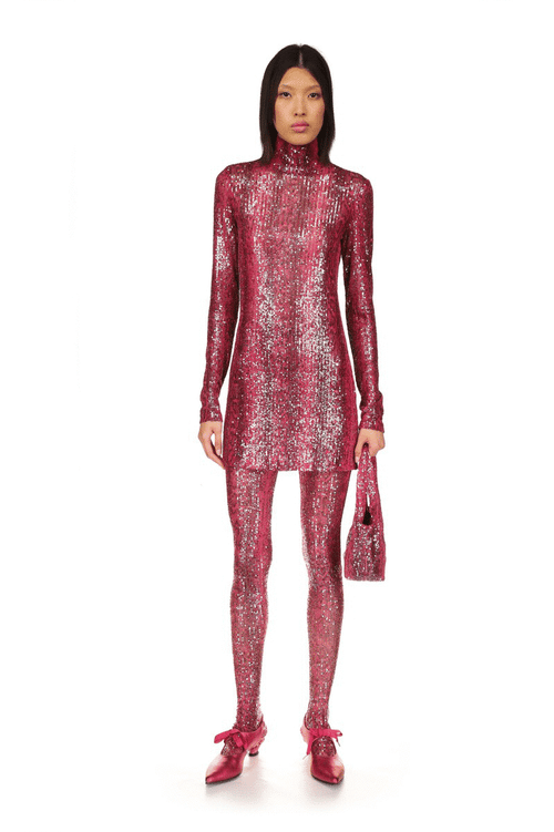 The long sleeves and turtleneck collar, shiny ruby red color, with a red zipper on the back