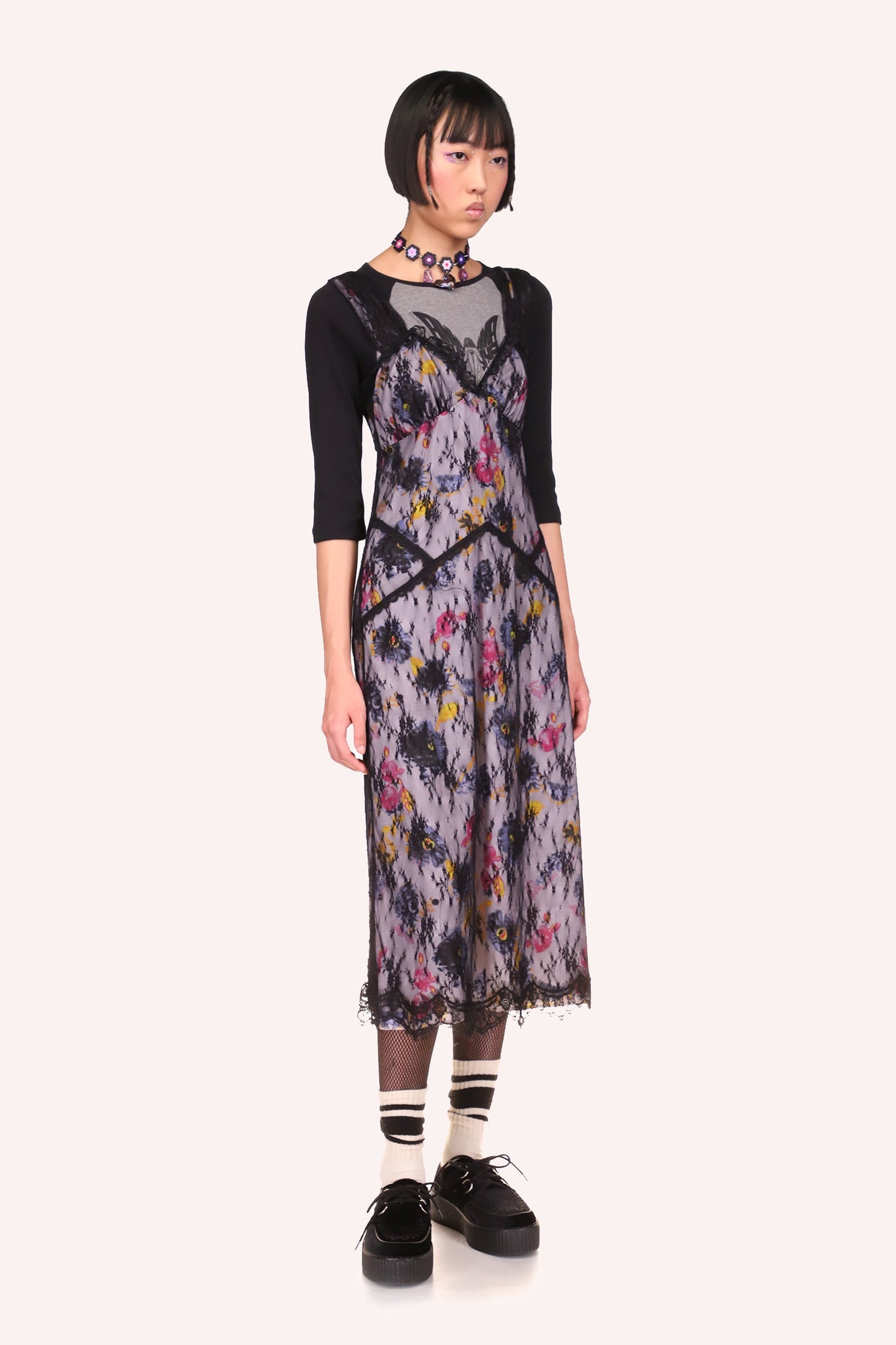 Slip Dress sleeveless, lilac, pink, yellow flowers, 2 straps, black hems on side, mid-legs long.