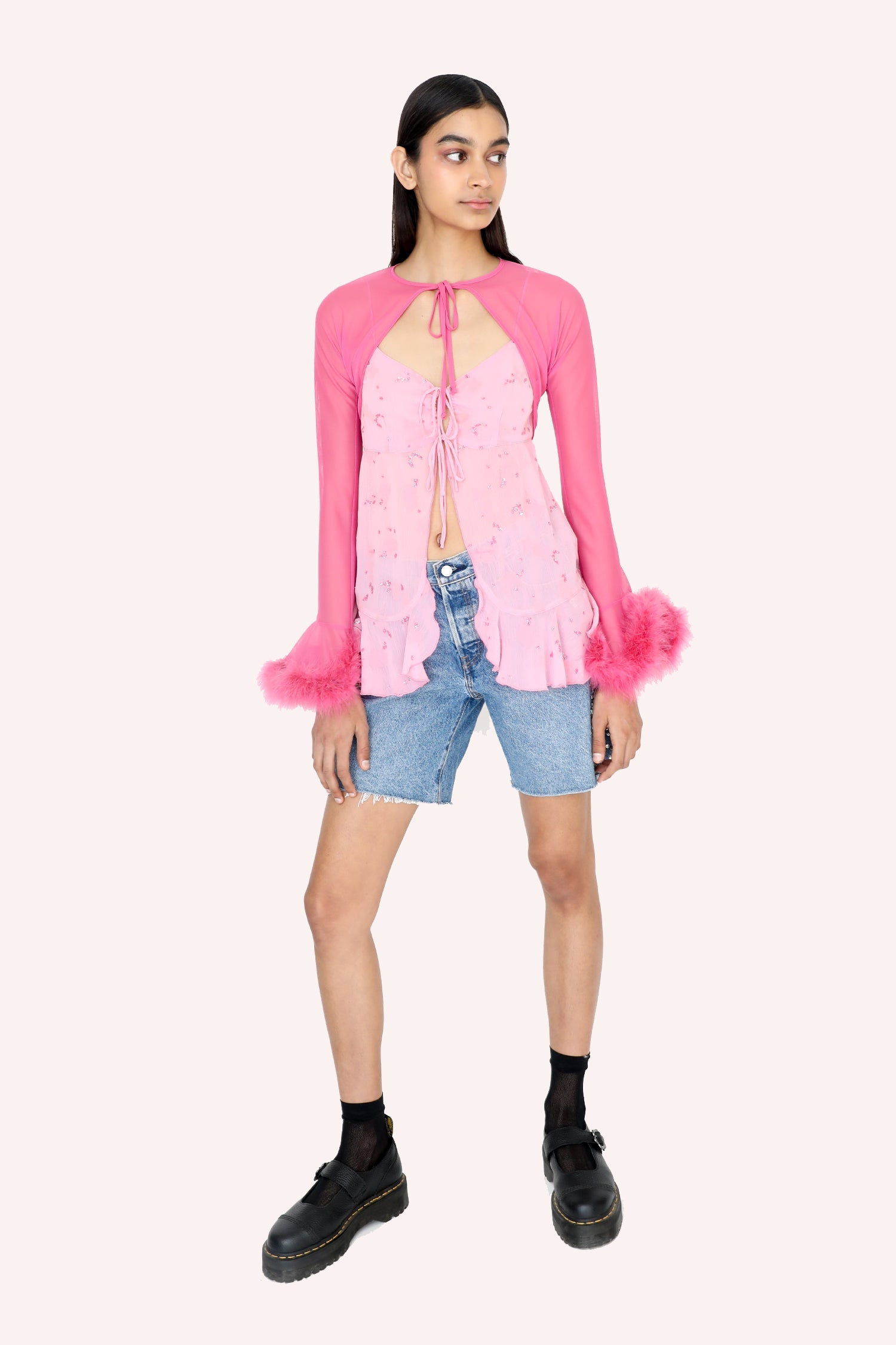 Mesh Bolero Pink, long sleeves, fluffy fur at wrist, a pink lace at neckline to ties up, open in front