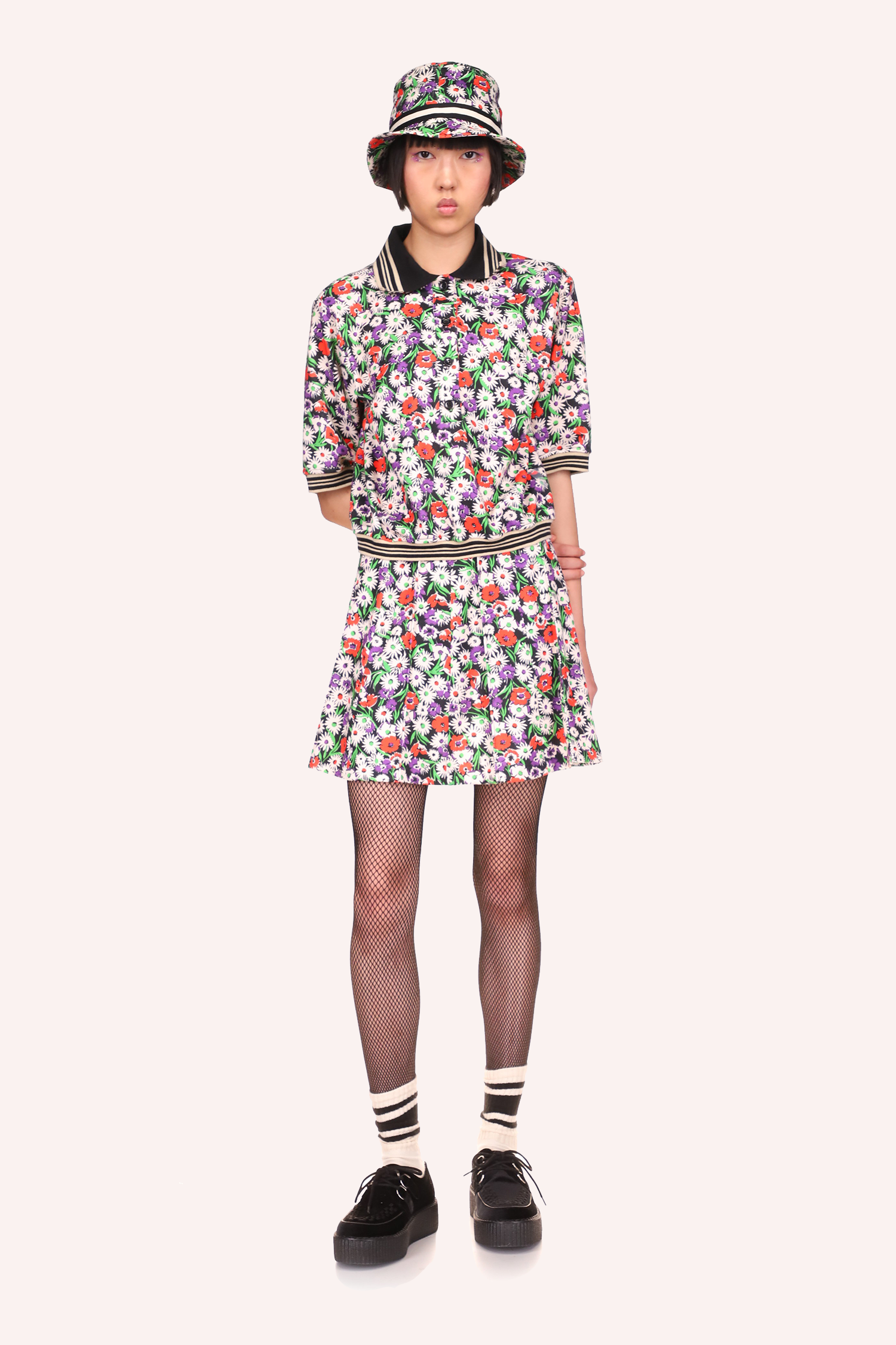 The entire skirt and top ensemble, Daisies skirt Top Rouge and Daisies Polo Top Rouge is very springlike 