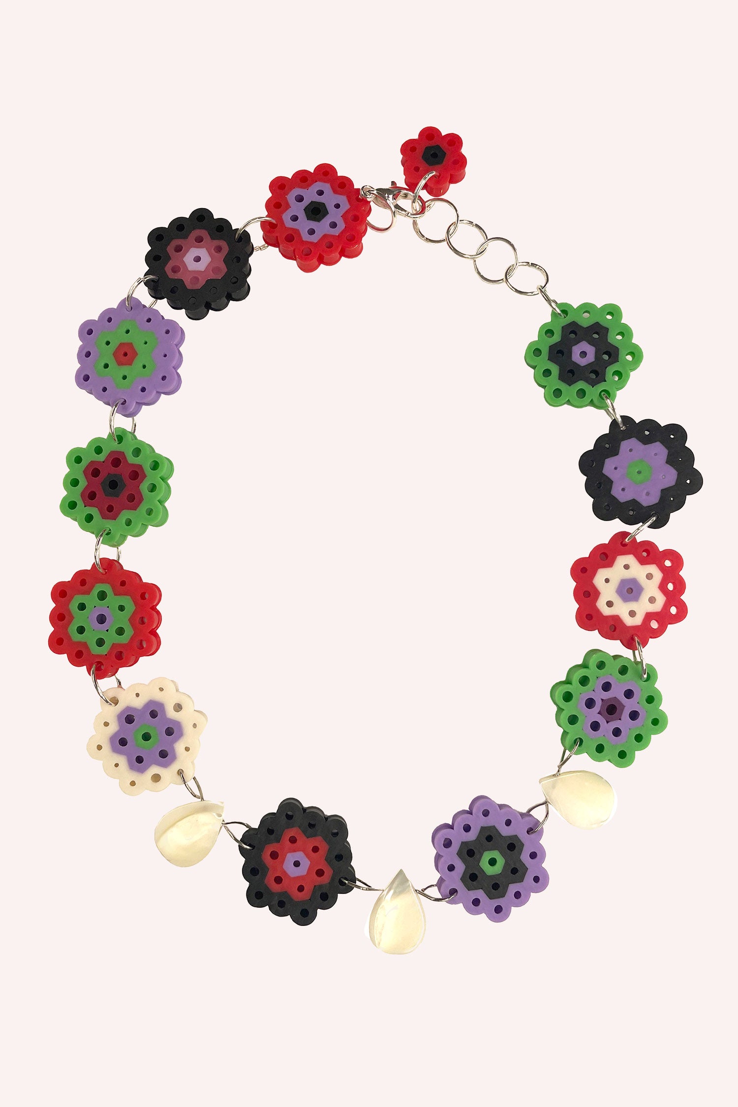 Daisy Chain Shell Choker Red features 14 daisy-like beads linked together with a chain, 3 shells in front