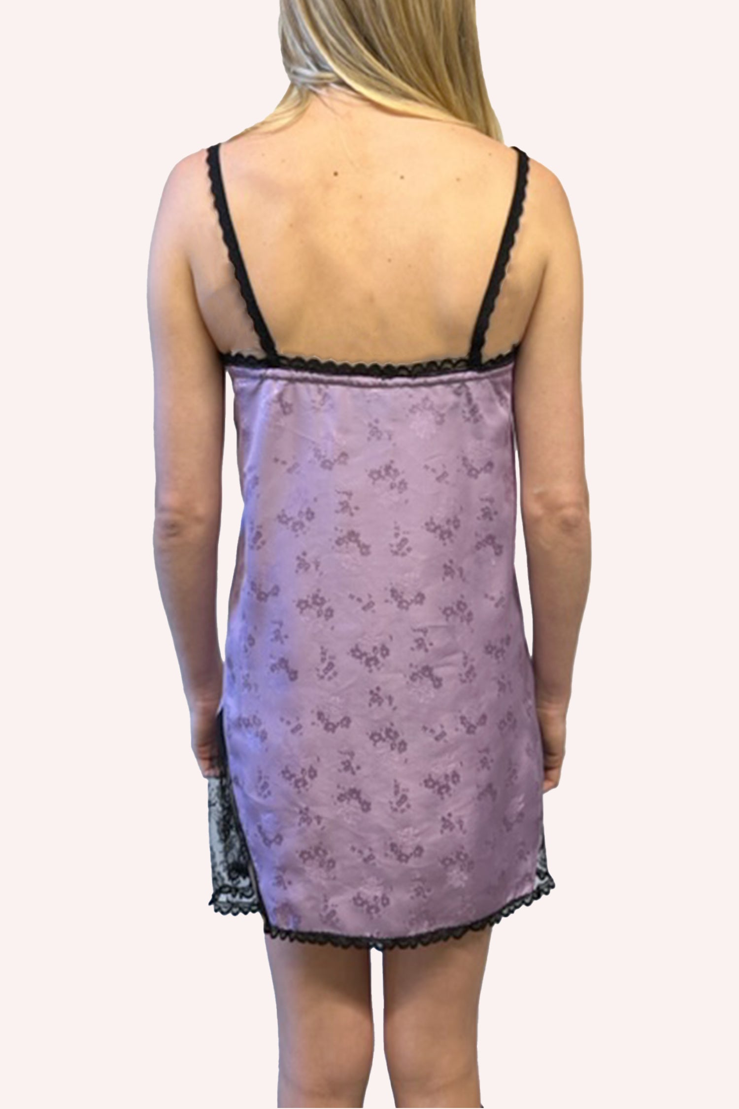 Sleeveless lavender dress, black lace at hems & straps, mid-thigh long, low cut on back