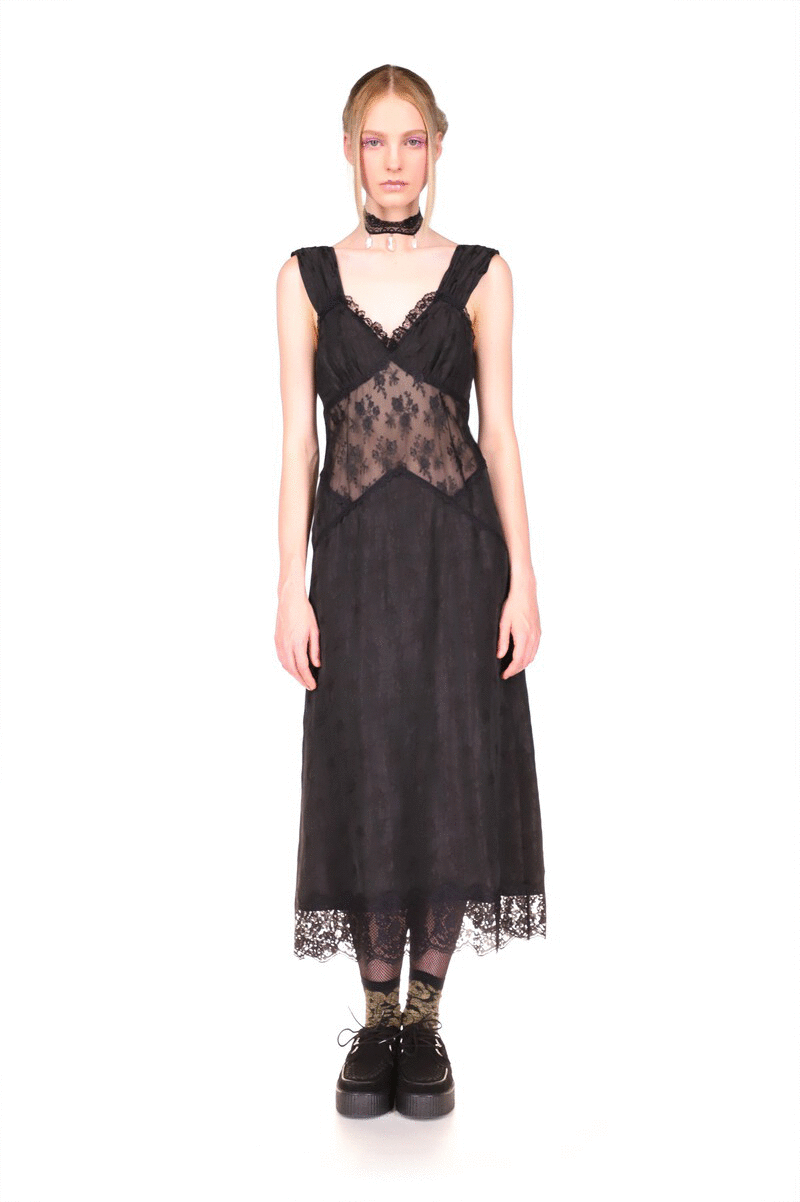 Lines between the fabric and the lace are in triangles shape, up over hips, on the front, down on the back 