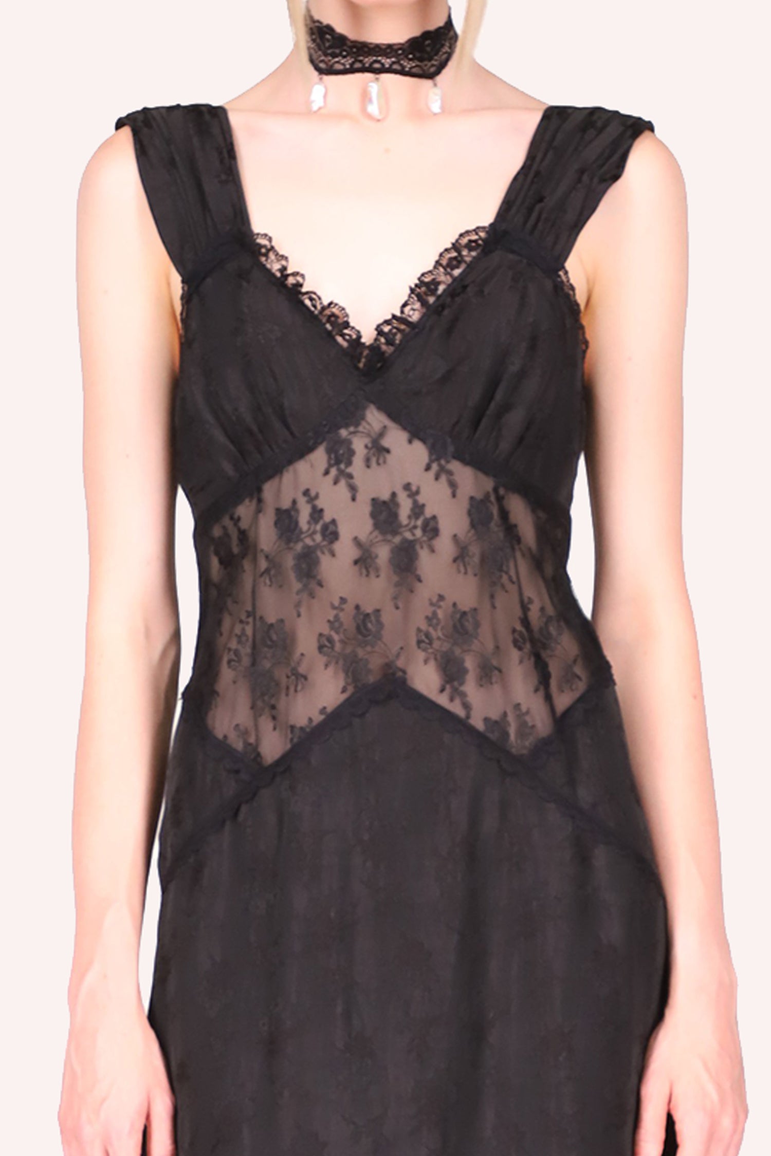 Floral Jacquard and Lace Dress black,  Detail of the black lace in front, with floral design and the triangle shapes 