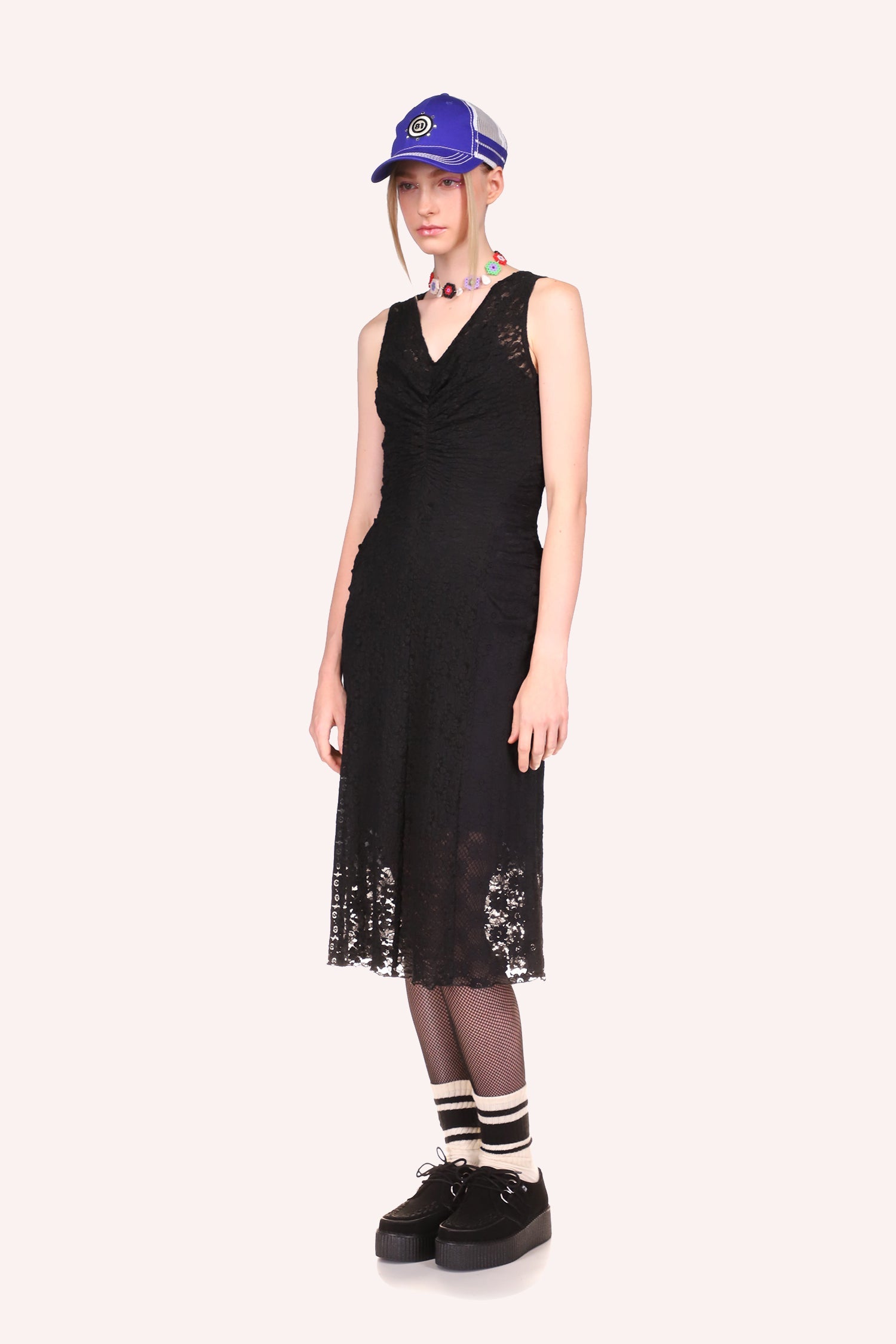The lace fabric dress offers a sheer view of your outline, from knee down is black lace