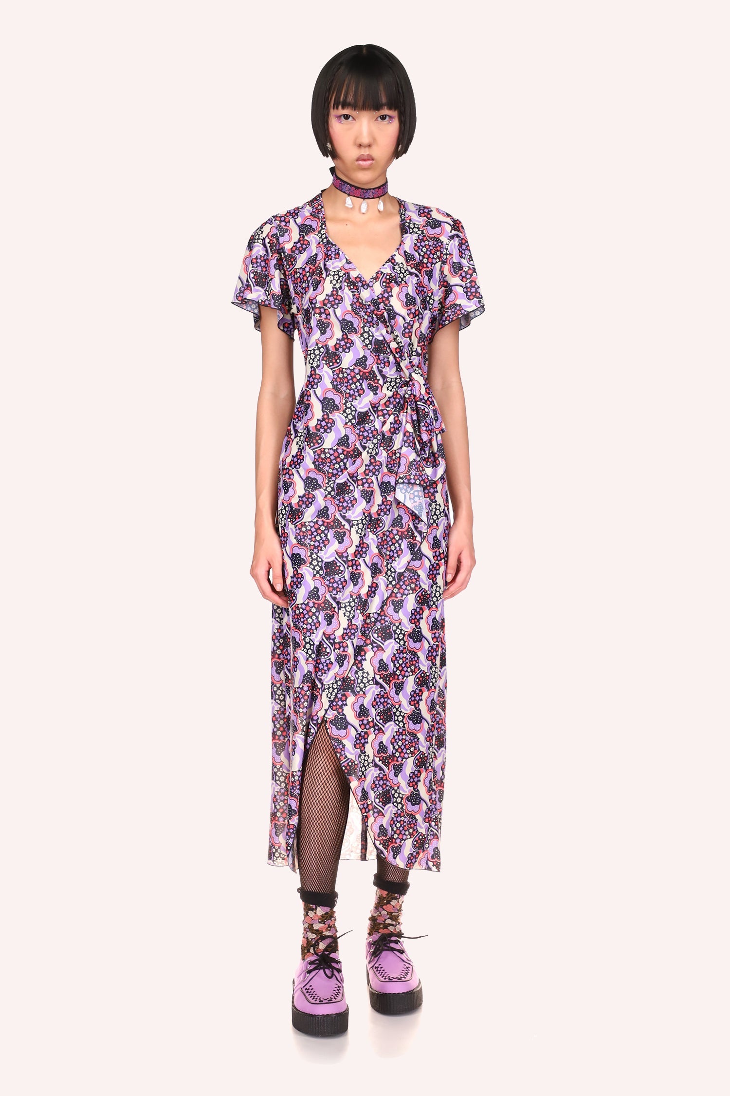 Wavy Clouds Wrap Dress Lavender front shorter than back, shows a rounded edge under knees