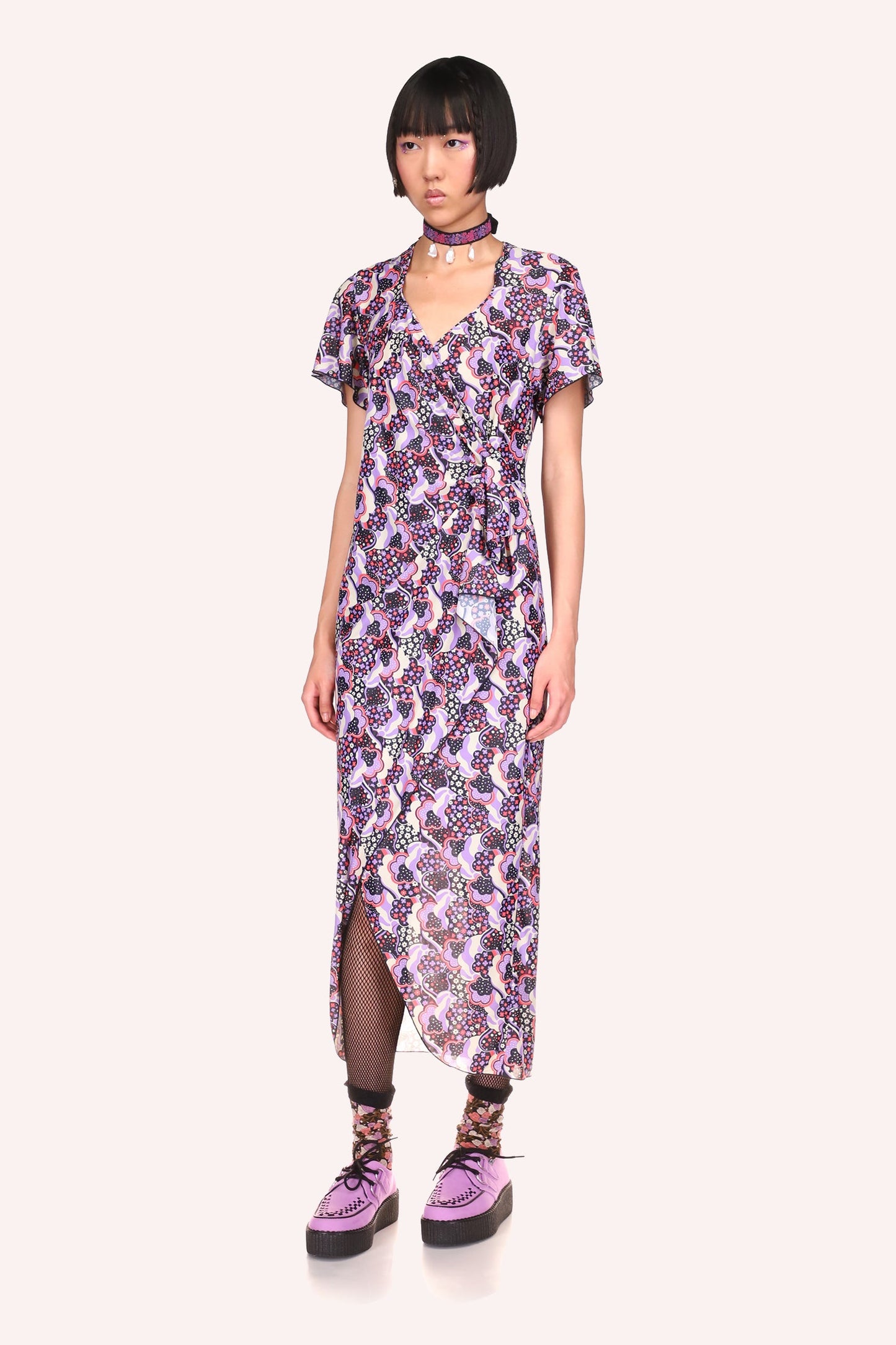 Wavy Clouds Wrap Dress Lavender, tied on the left side to create a ruffled effect