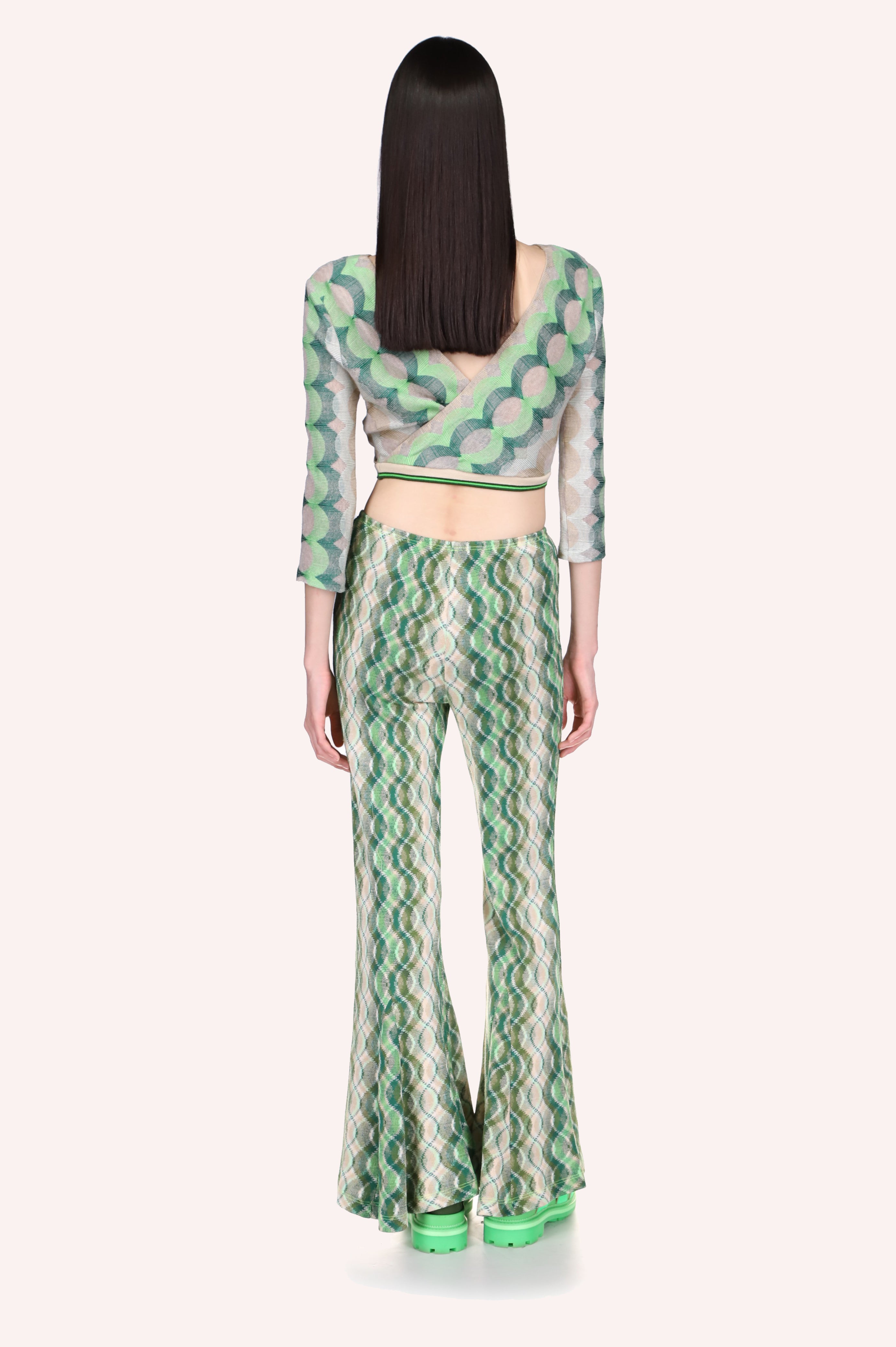 Wave Rider Knit Pant, long fitted pants on the hips, design of wavy lines in different shades of green