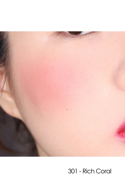  301 - Rich Coral of this powder spreads on the cheeks and clings tightly on the skin.