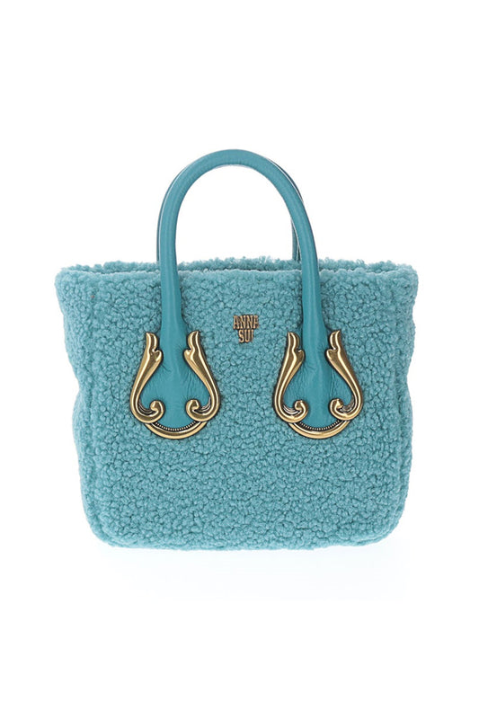 Bag Blue Anna Sui logo in the fluffy material, 2-handdles highlighted with a golden arabesque