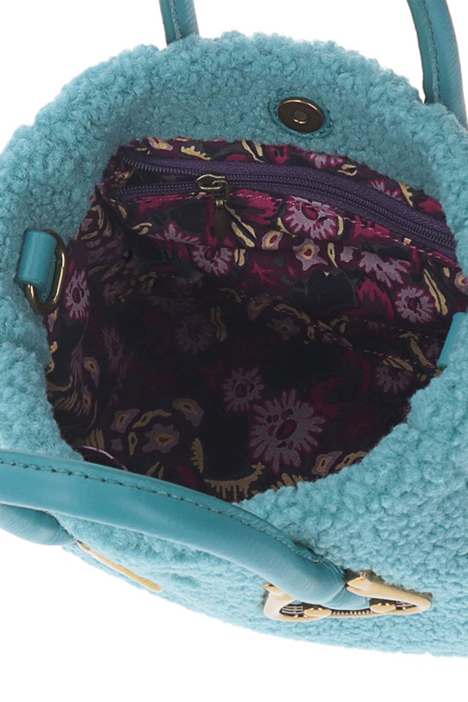 Magnolia Teddy bag Light Blue open has a dark floral design, plenty of space for your belonging