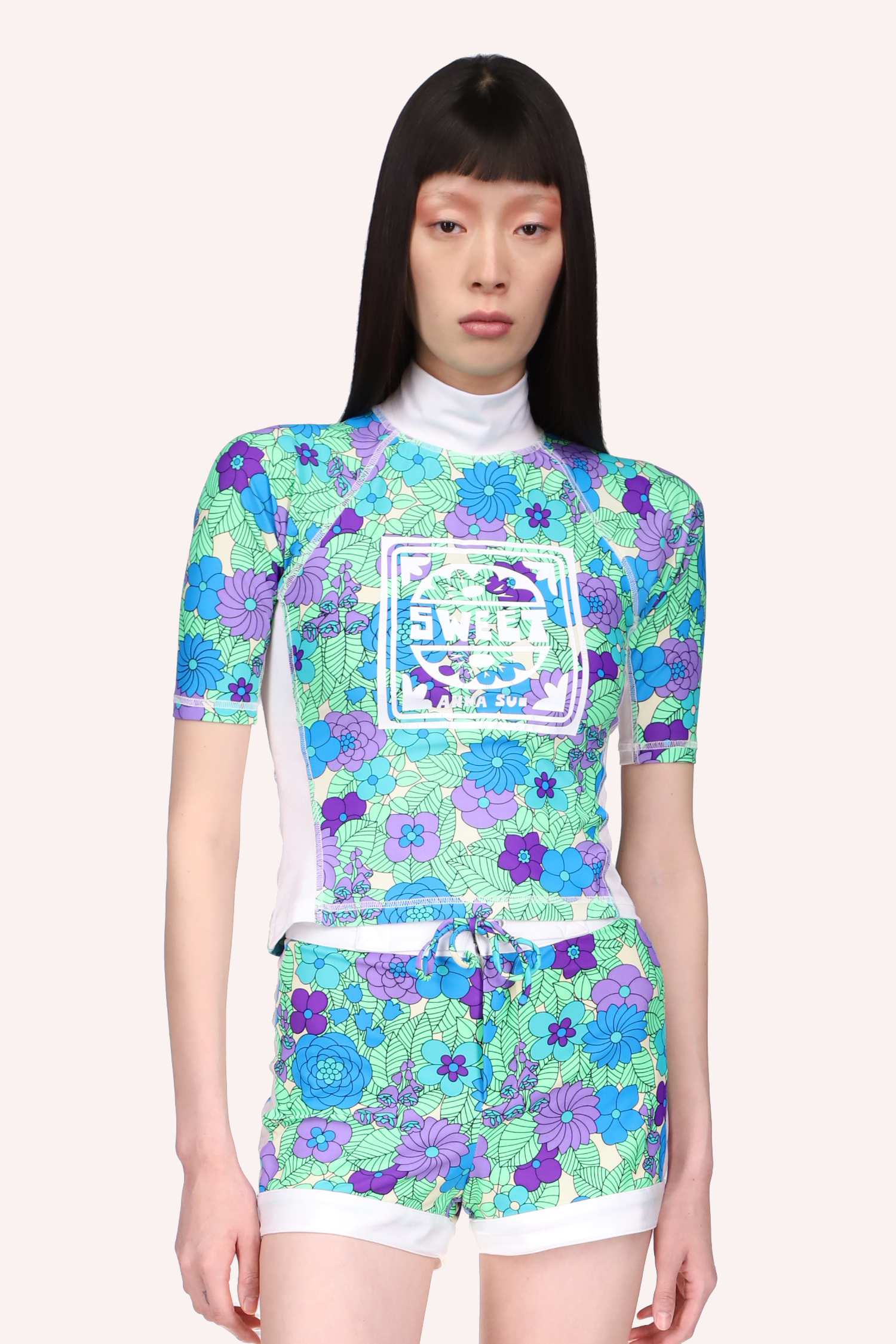 Beckoning Blossoms Surf Top Orchid, short sleeves, above waist long, turtleneck, in an overall blue color