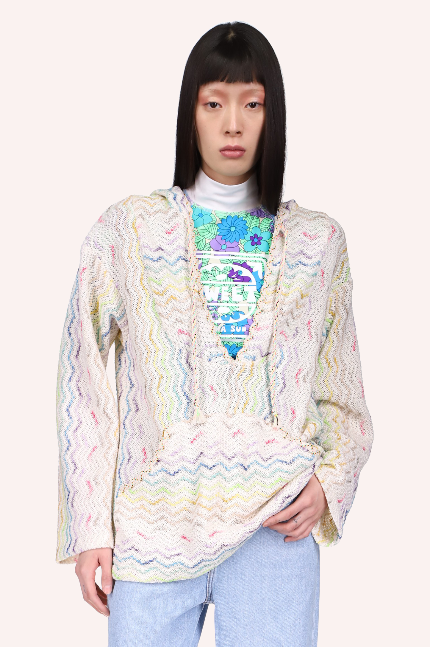 Shangri-La Knit off white white, blue, yellow & green insert, deep collar cut with a lace, knit texture