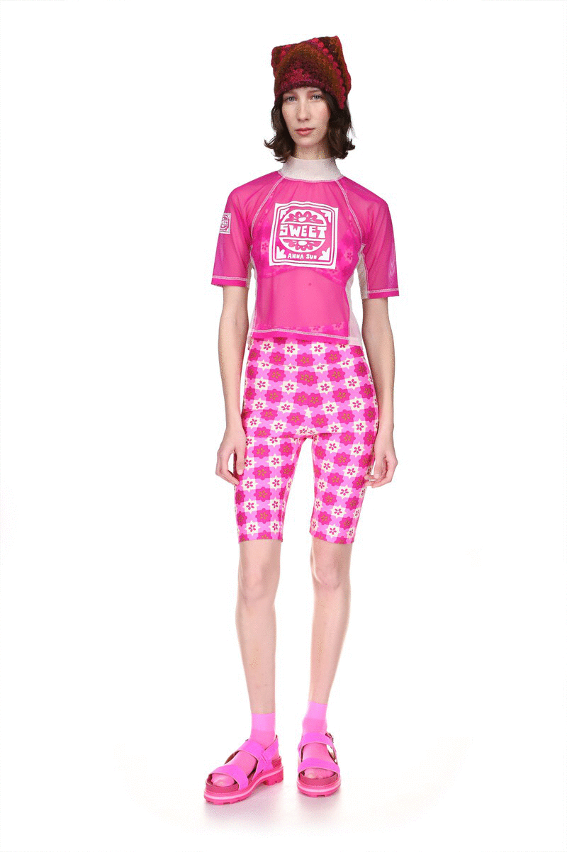 Utopian Gingham Bike Shorts Neon Pink, just above the knees, very tight and form-fitting.