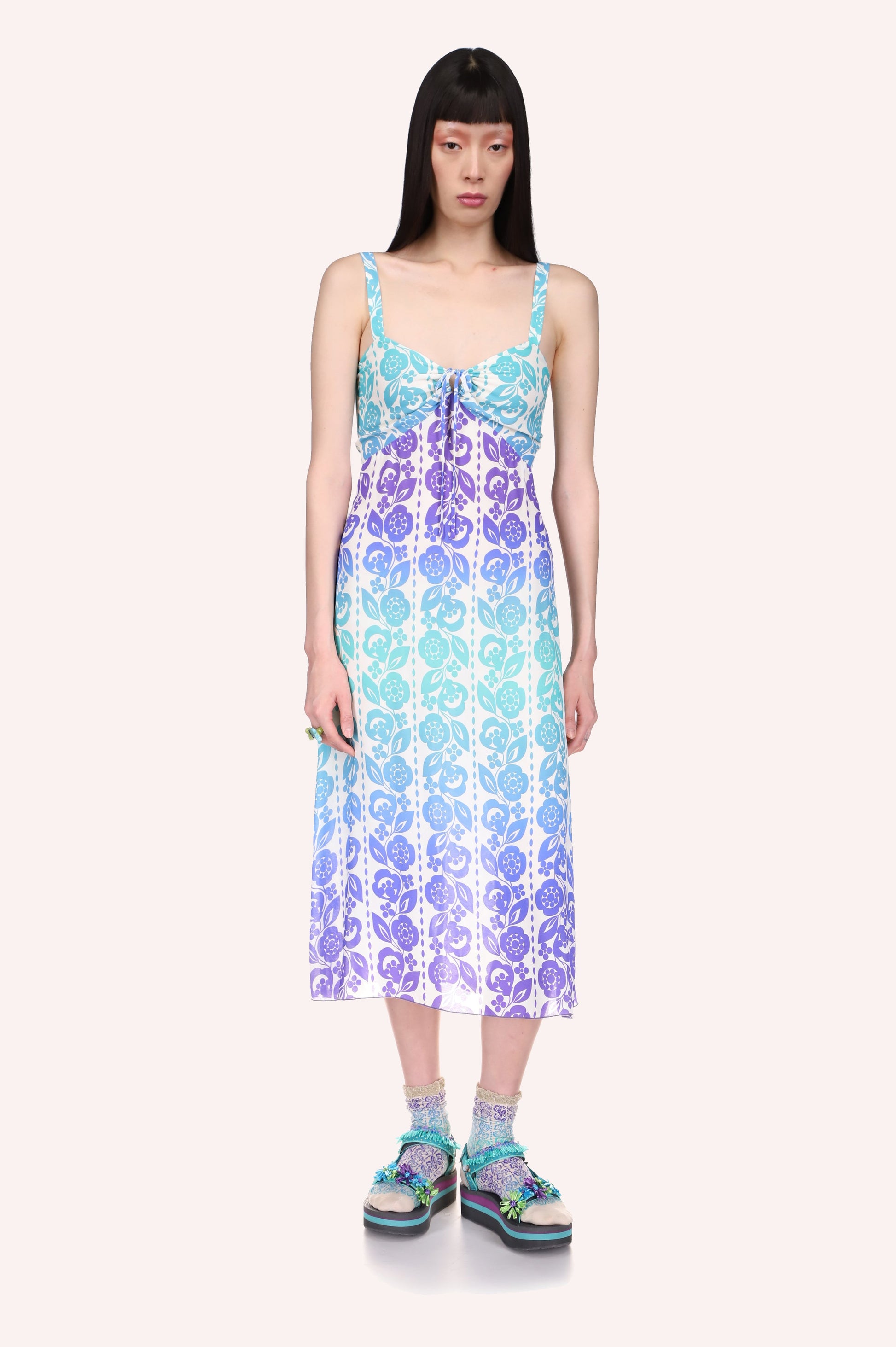 Radiant Ombre Slip Dress, mid-calf long, sleeveless, bluish floral design, ribbon knot in front