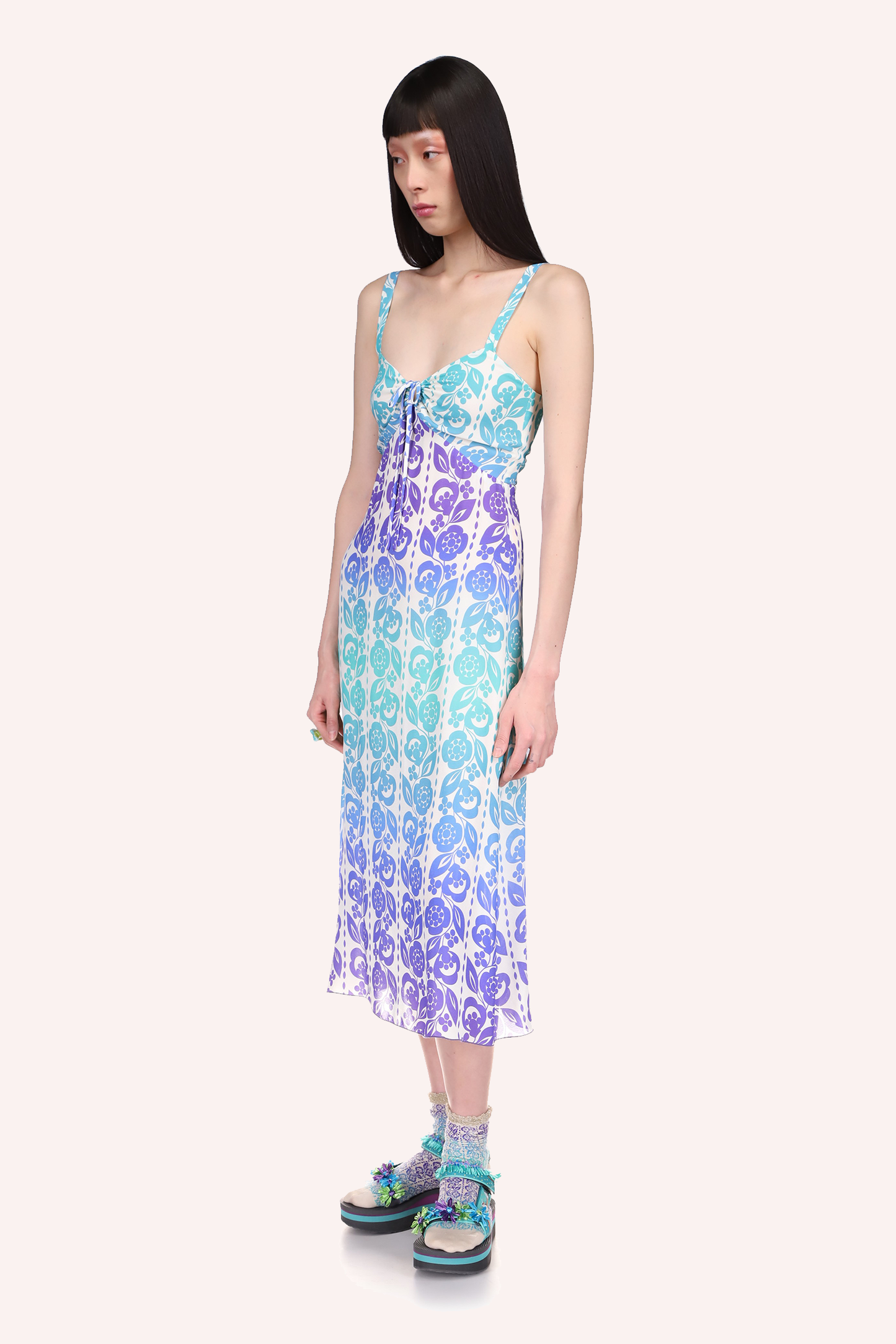 Radiant Ombre Slip Dress highlights your curves, the neckline is plunging