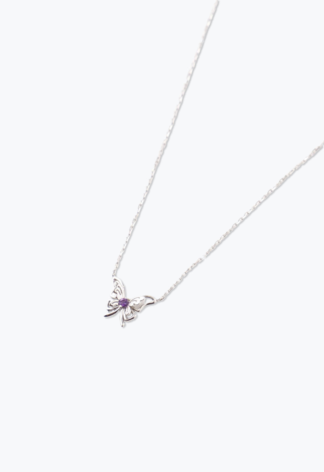Ribbon Butterfly Necklace, butterfly is silver Plated metal, an Amethyst is at butterfly center