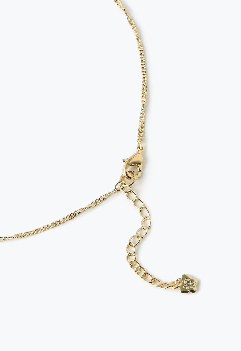 Gold chain, lobster claw clasp with large links for adjustability, Anna Sui imprint on a tag