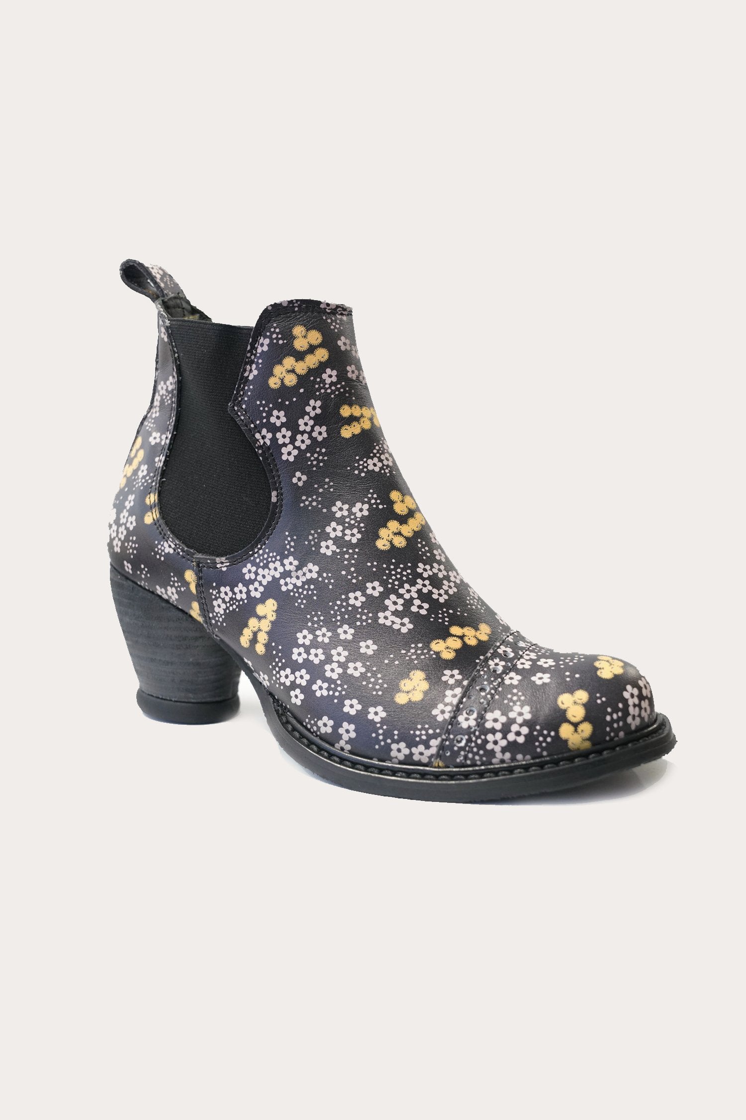 Ditsy Blooms Boot, black high heel, white/yellow floral design, black side elastic, strap on the back 