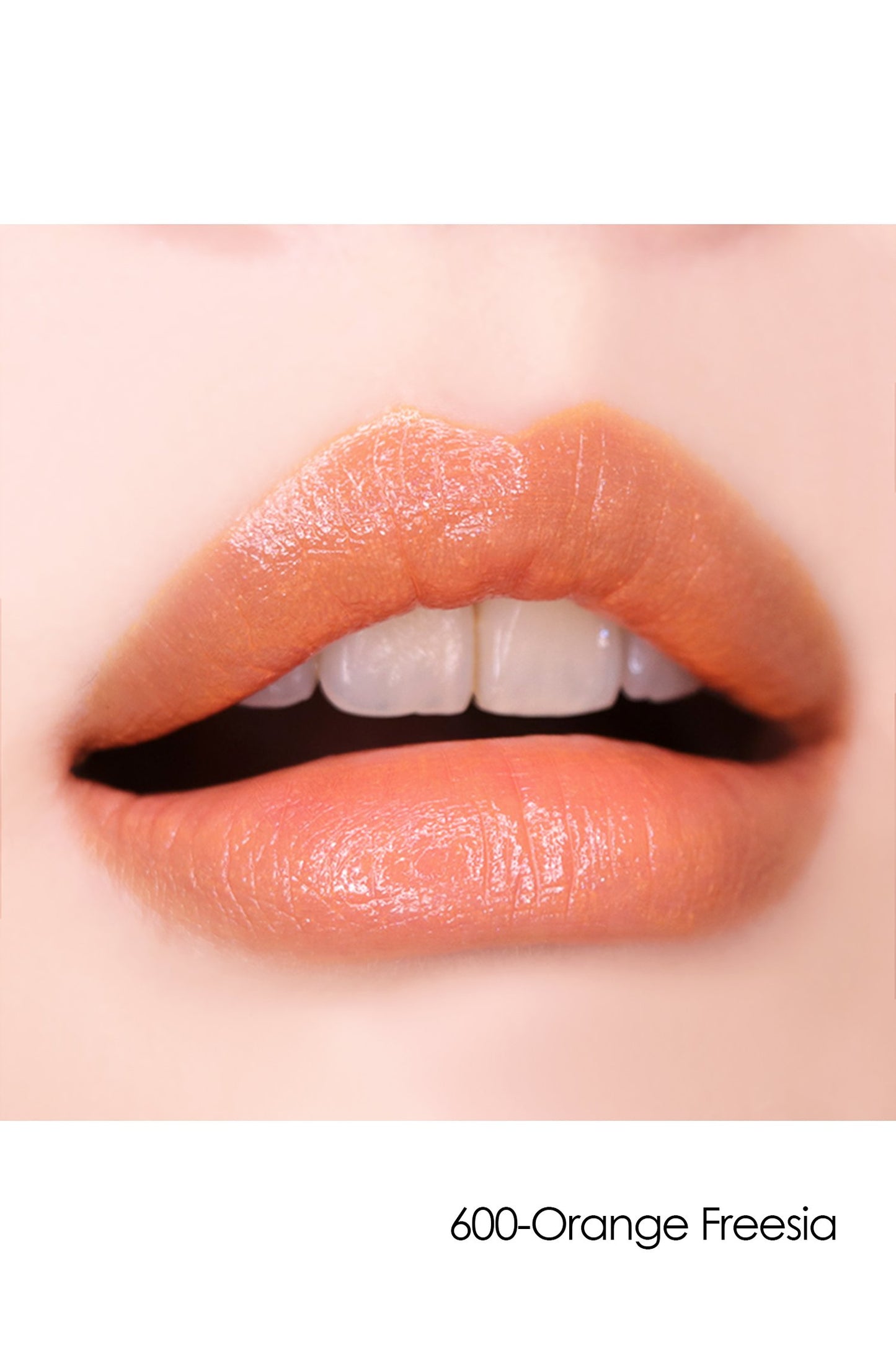 Lipstick S: Sheer Flower 600-Orange Freesia on lips