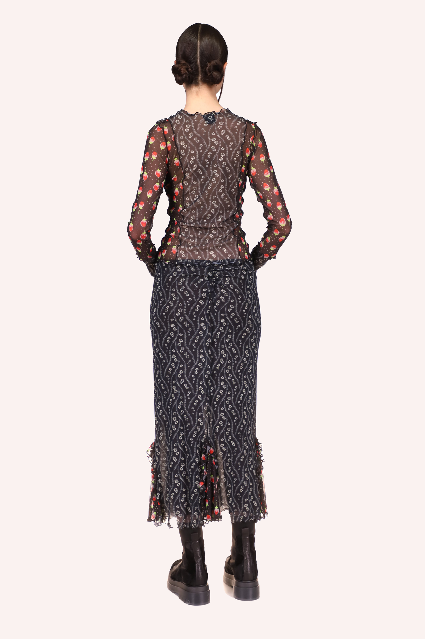 Fitted skirt above ankles long. Transparent ruffles at bottom 