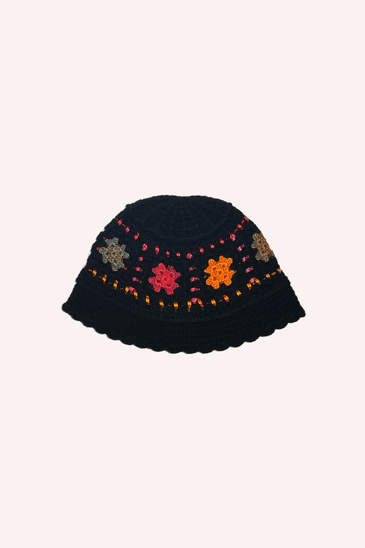 Ombre Crochet Bucket Hat Orange, Black background with dotted lines red and orange around