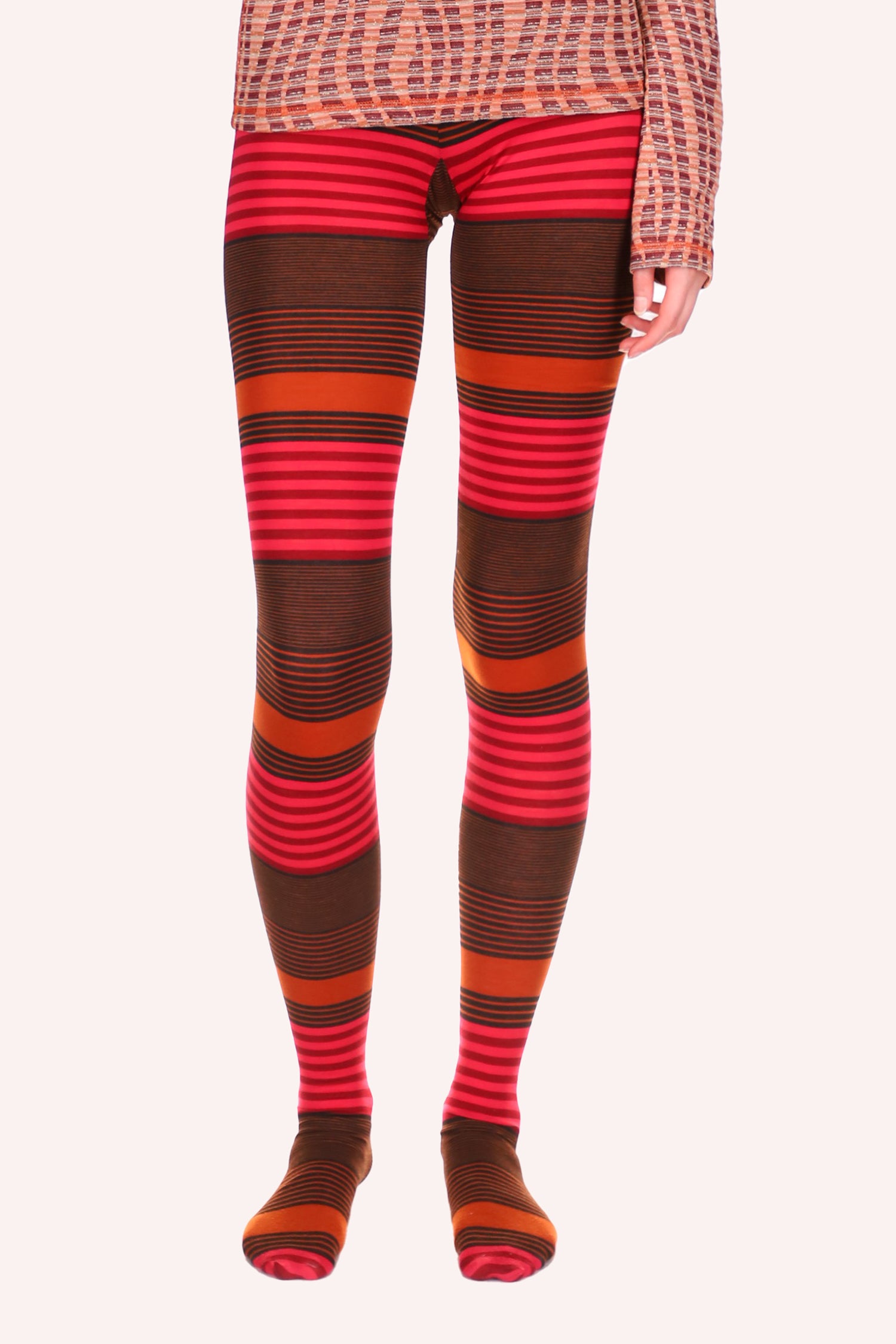Mod Stripe Knit Tights, different sizes of bands orange hue, pink, red, and brown around the legs