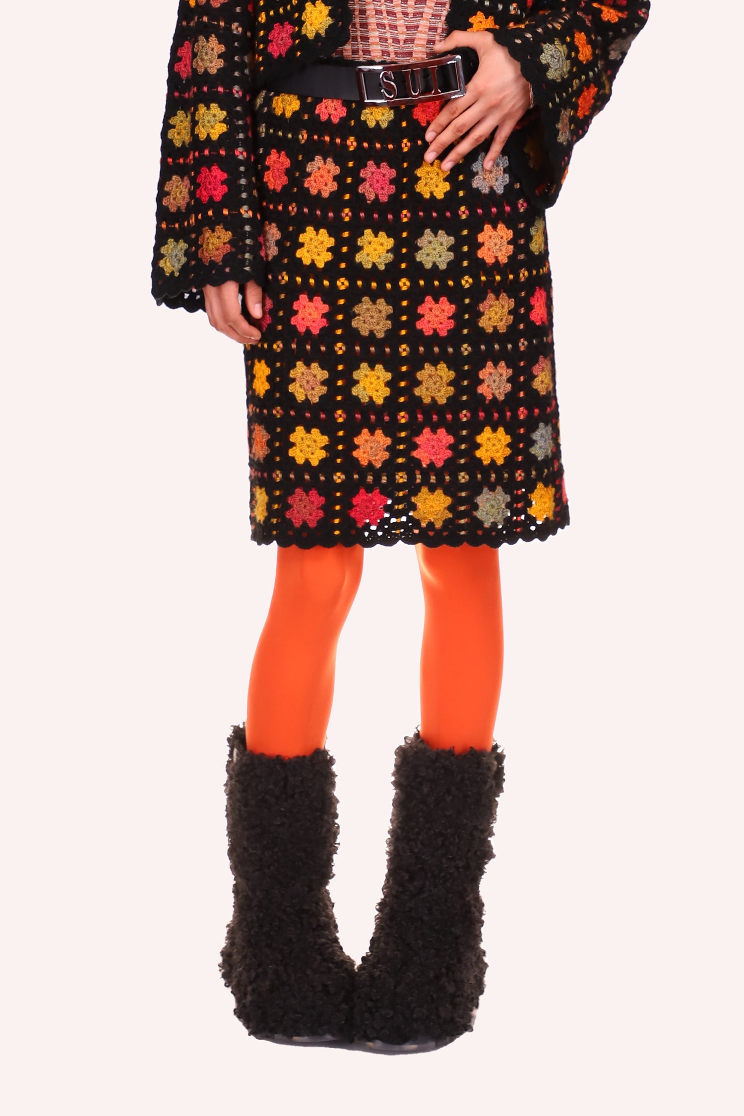 Stainglass Crochet Skirt Orange, knees long, pattern of squares of orange dots, stars like in Orange, red, blue, greenish 