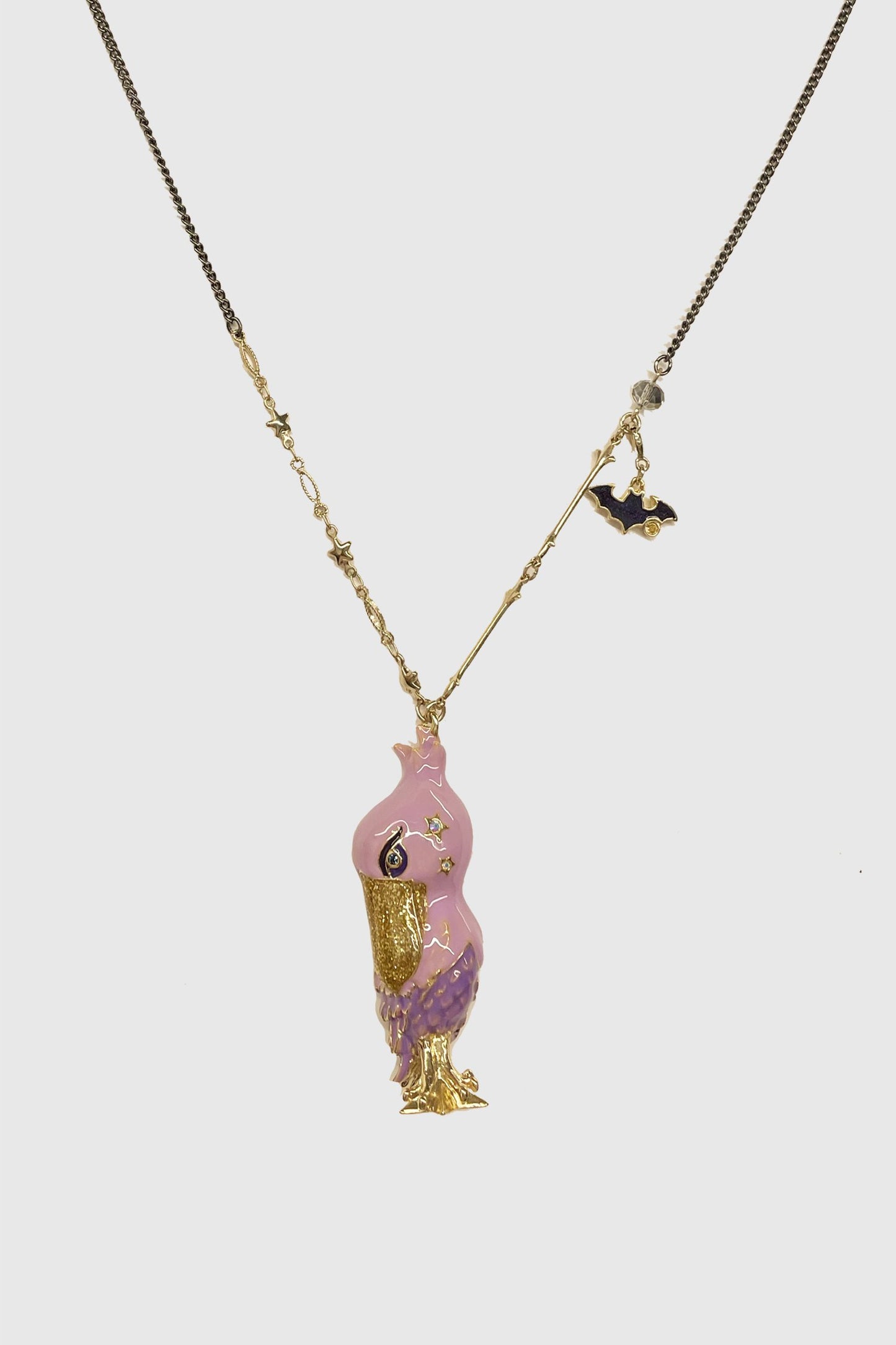 Necklace, Pelican pink on top purple bottom, golden highlights, gems and a bat on a golden chain