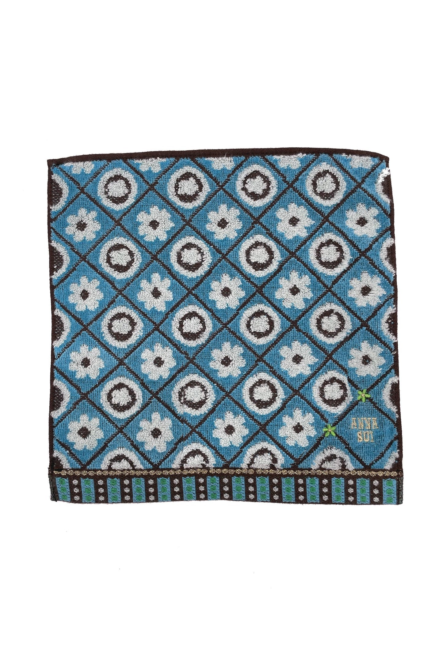 Washcloth light blue with Floral Lattice in white, black lines to highlight the diamonds, Anna Sui's label