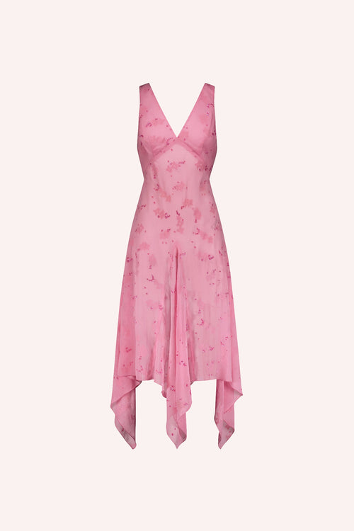 Detail of the Flock Crinkle Chiffon Dress in pink with a darker pink floral pattern, hem in a shade of pink under the bust line