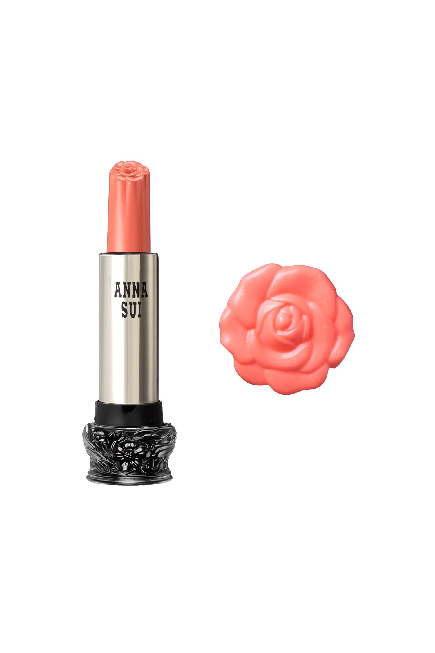 600 - Coral Sweet Pea Lipstick F: Fairy Flower, in a cylindrical container, large black base, engraved floral design, metallic body