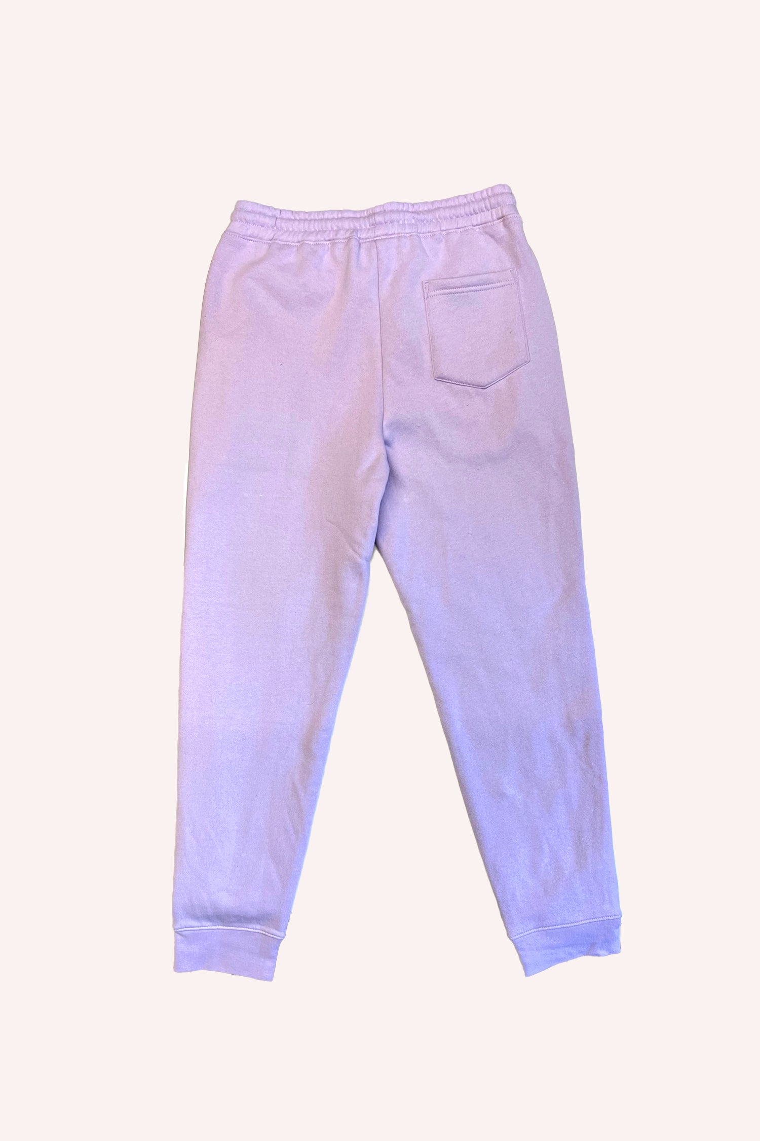 Pantalon de survêtement Mushroom Lavender, 2 poches, un lacet lavande en guise de ceinture, une poche arrière à droite 