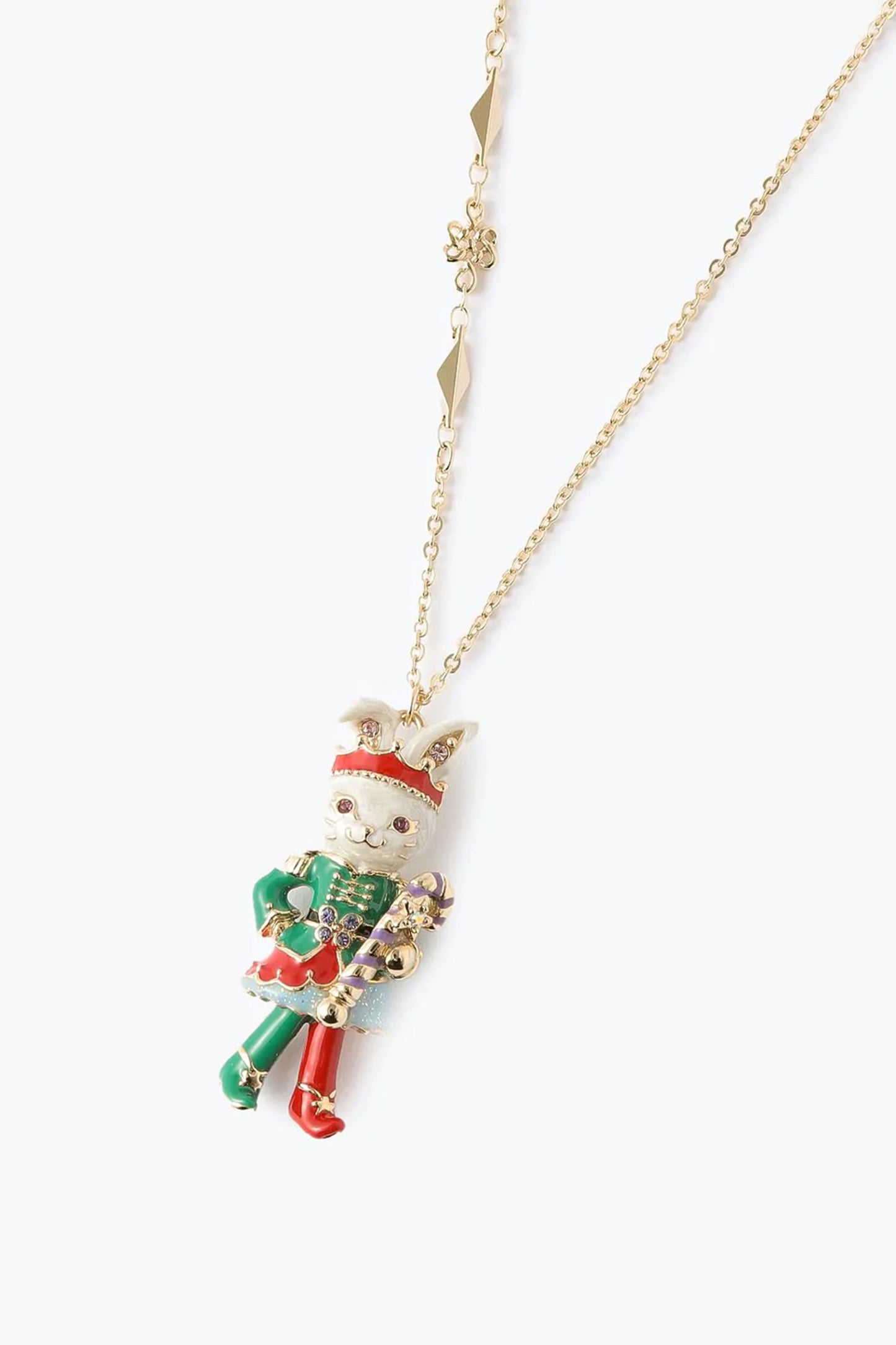 Pendant Christmas bunny on golden chain, white bunny dressed as a green and red nutcracker