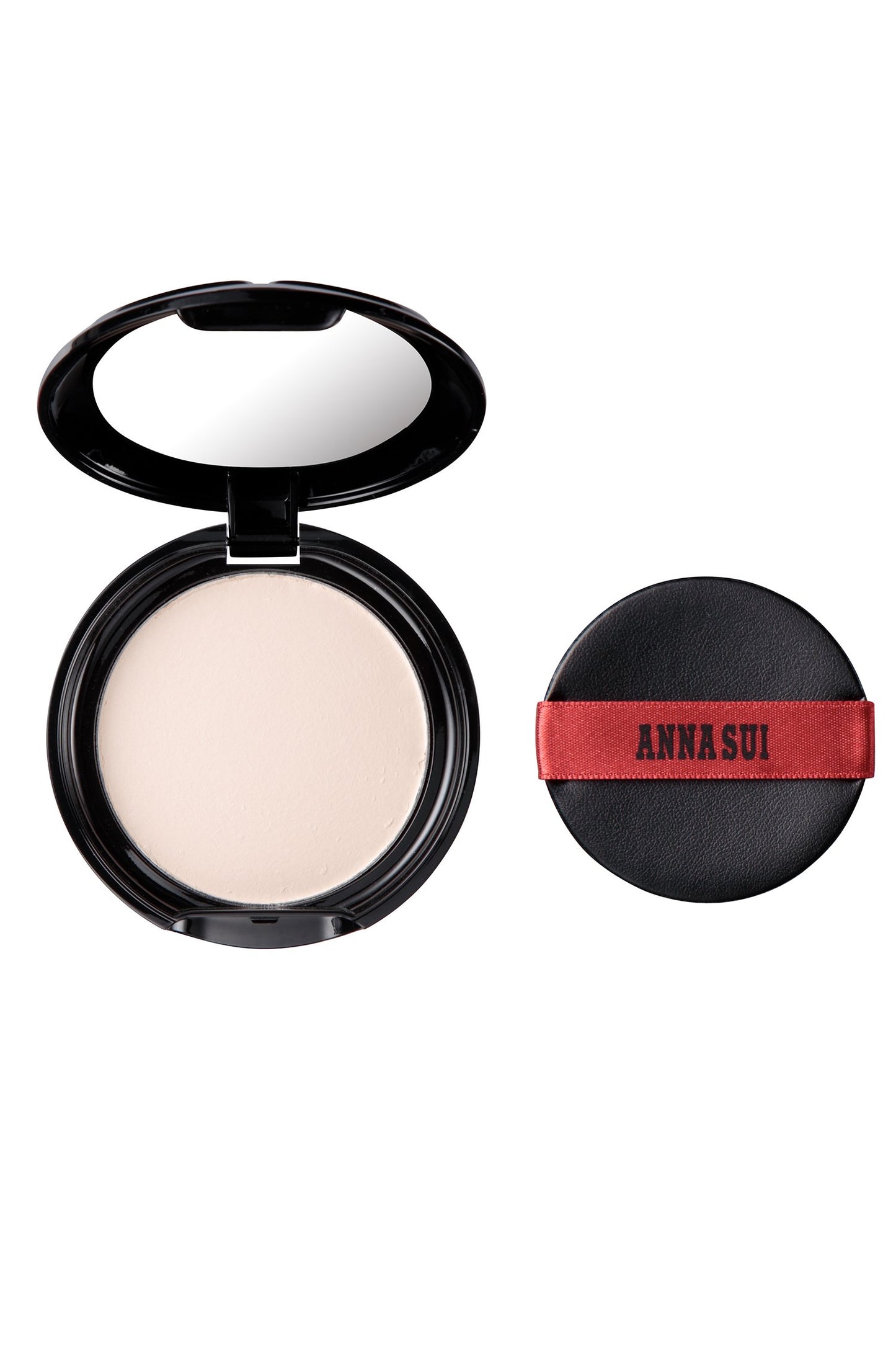 Open powder case, rounded black, powder mirror, black pad with red ribbon, black Anna Sui label