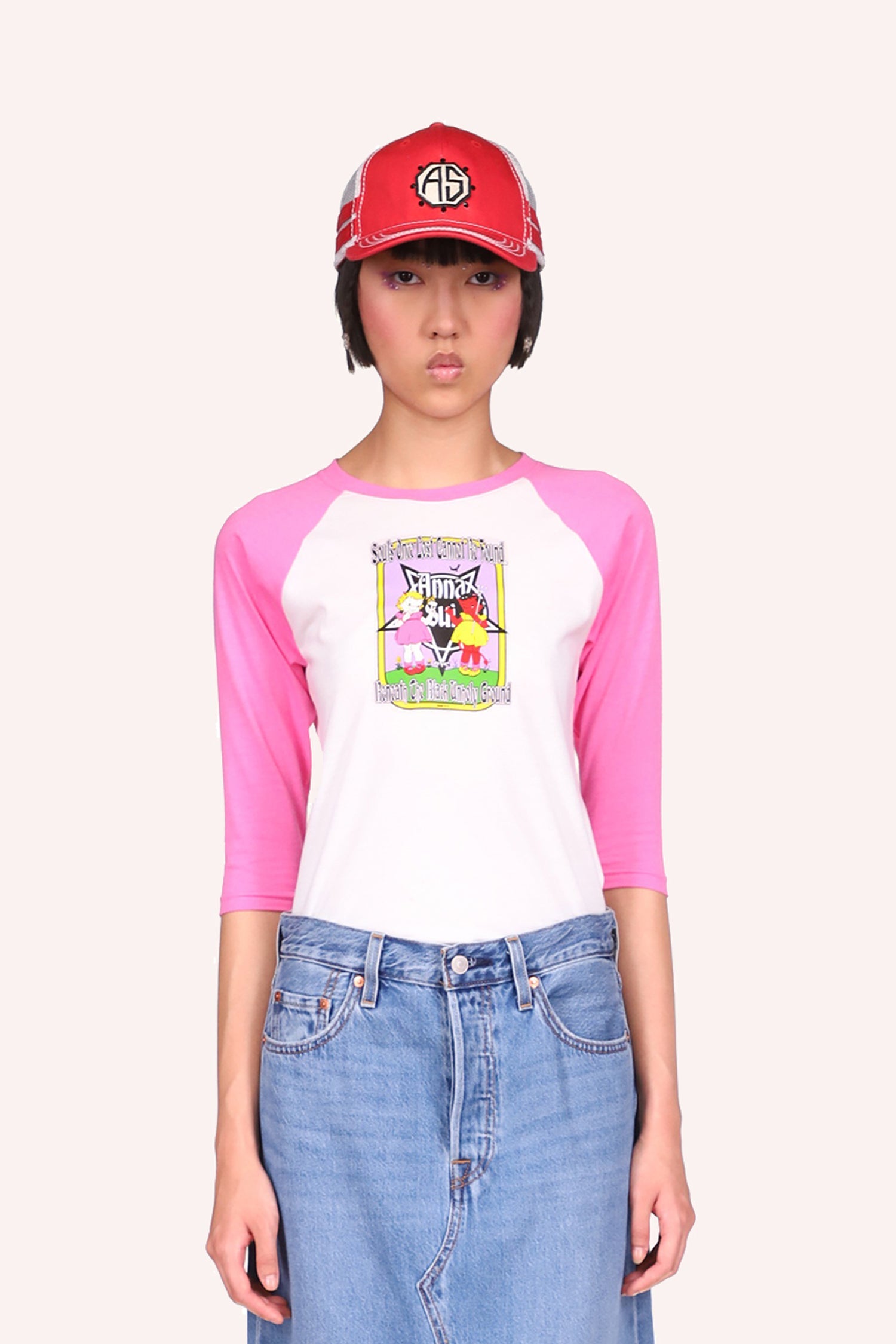 Tee, elbow long sleeves, pink shoulders and sleeves, white in front with a cartoonish Anna Sui