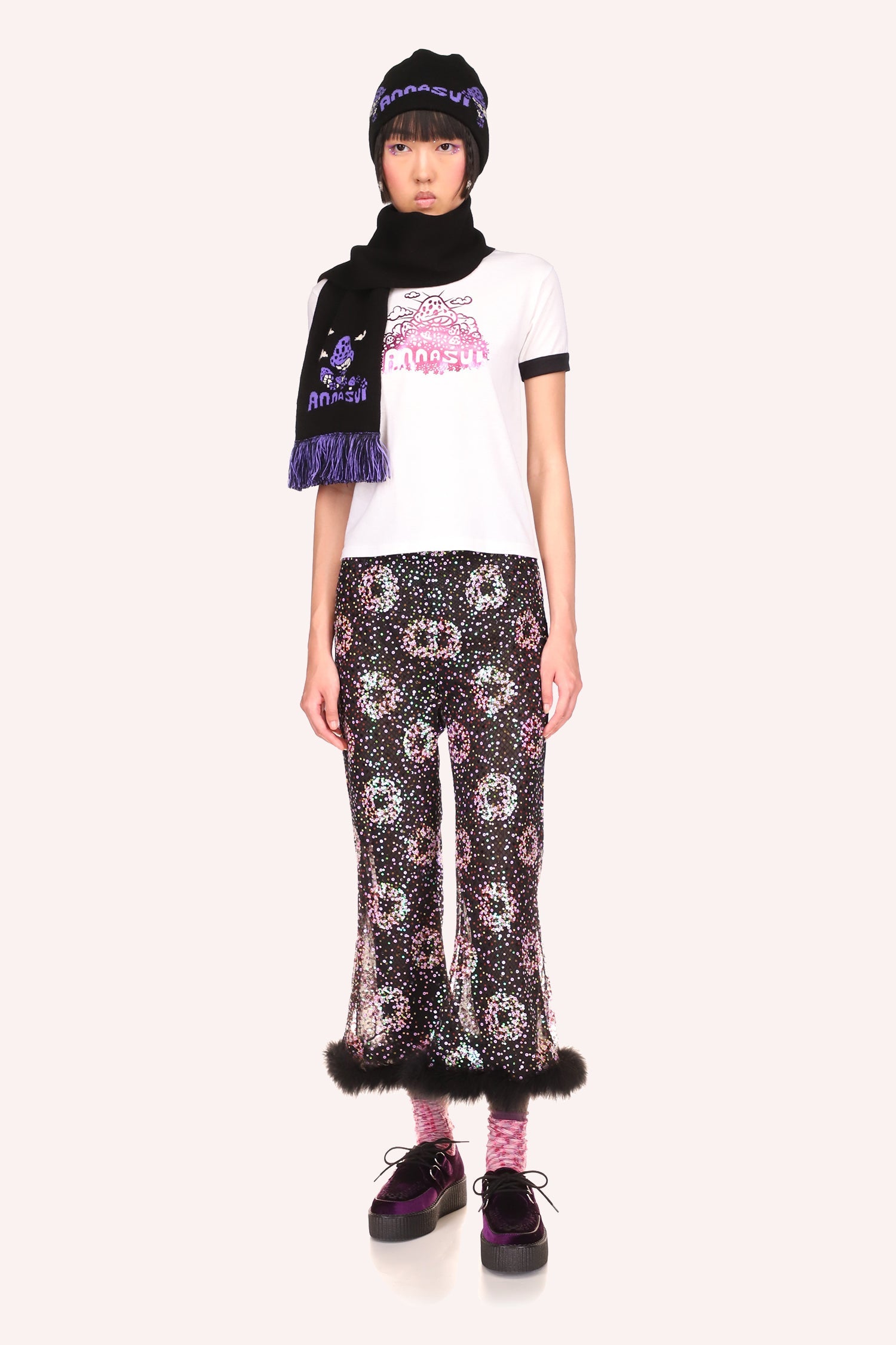 Mushroom Tee white, pink print of Anna Sui logo under mushrooms on a forest ground