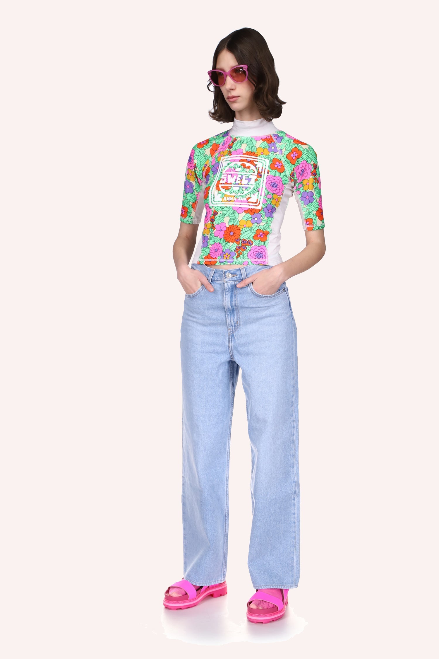 Beckoning Blossoms Surf Top in Marigold can be an asset to complement any pair of blue jeans