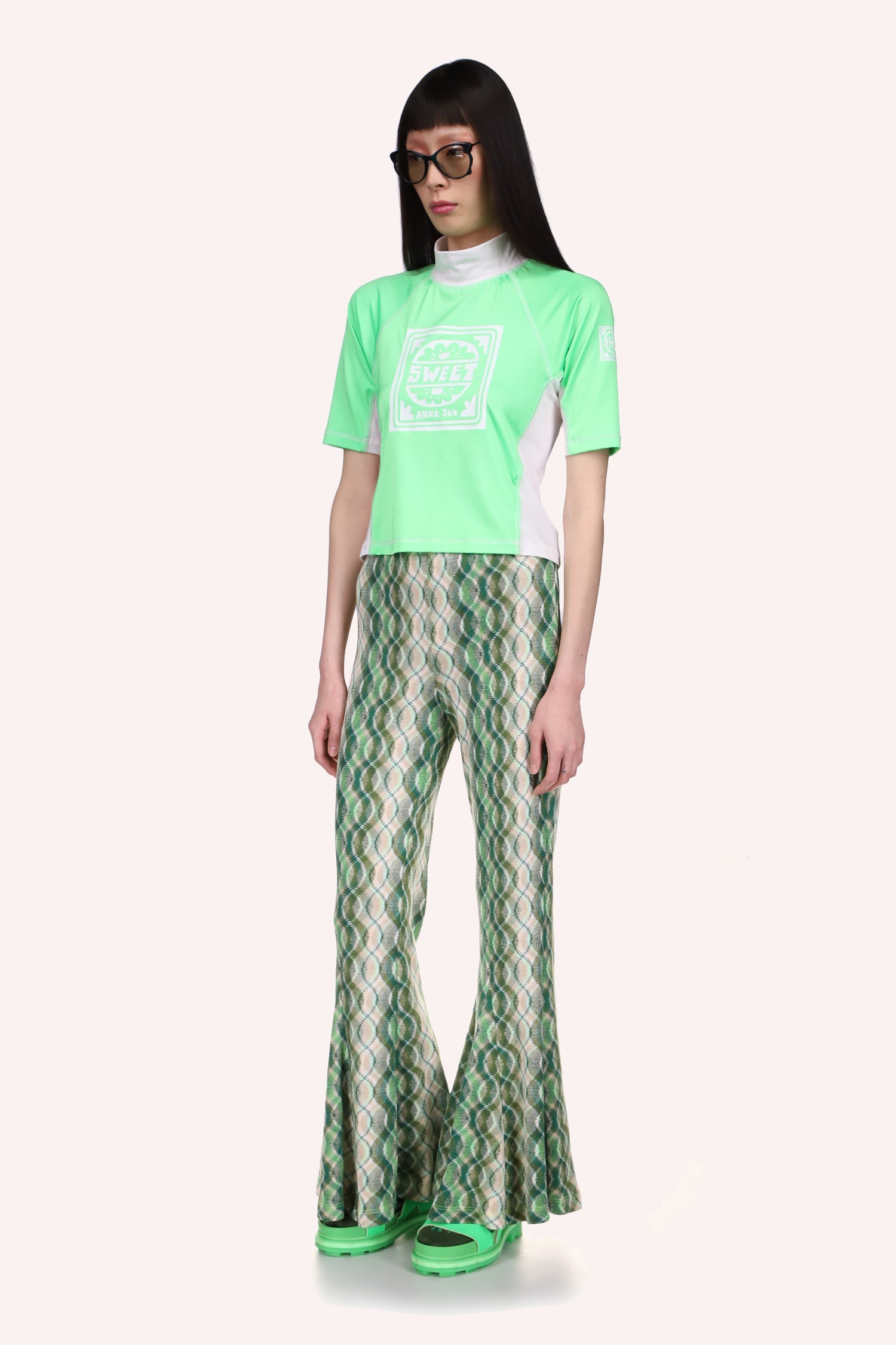 Anna Sui Spandex Surf Top, mid long sleeves, turtleneck collar, Glo Green In front with print