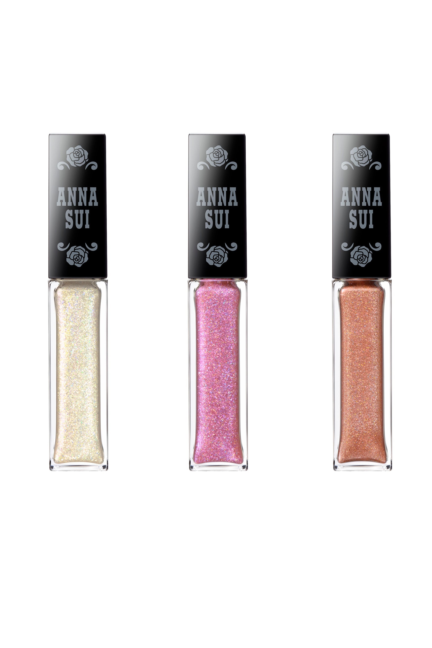 Pearlescent white, Pink parade, Honey glow are in a transparent bottle, white roses on the back cap, labeled with Anna Sui