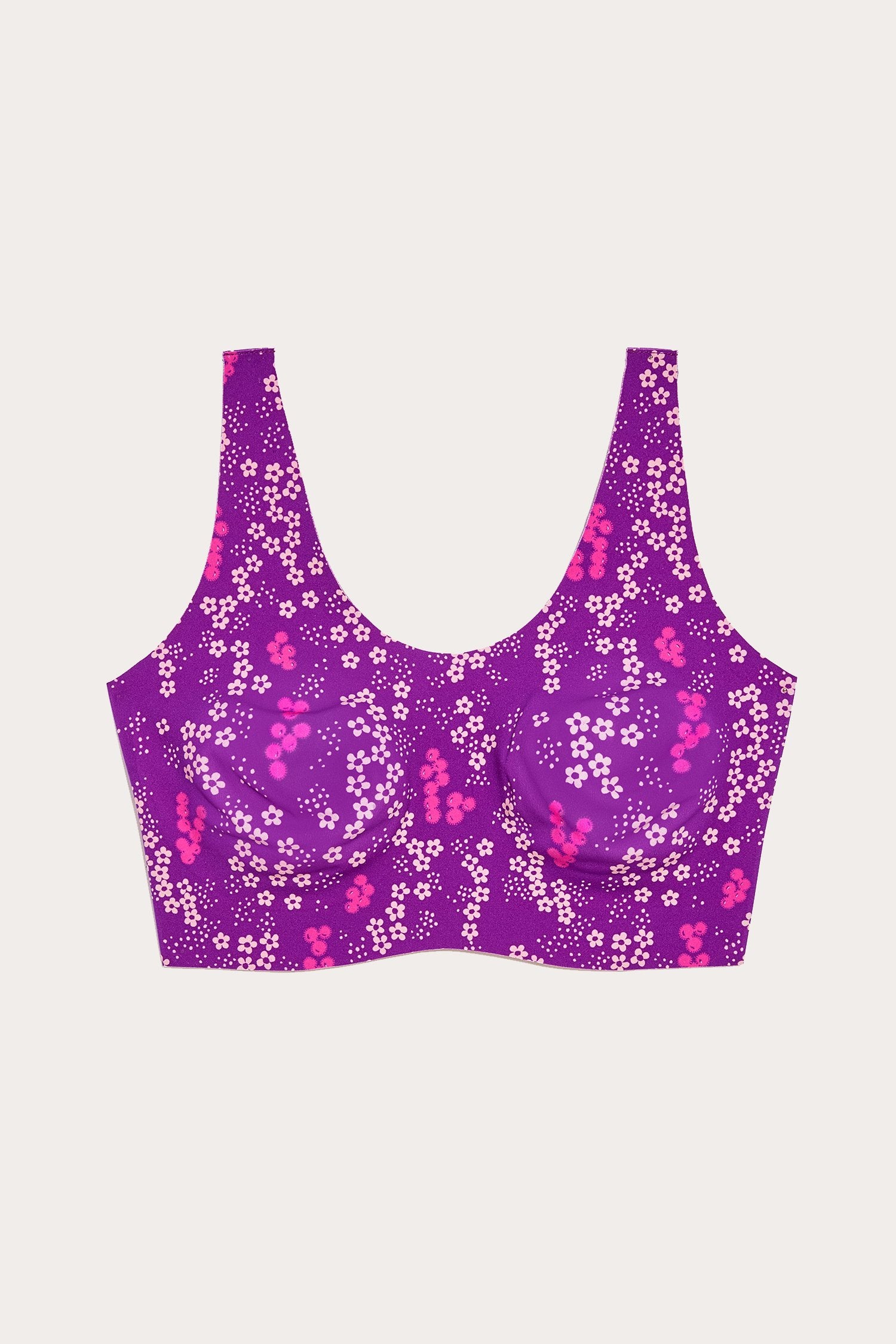 Anna Sui x Knix Ditsy Blooms, is a sport like Pullover Bra, purple with white daisies, and pink grapes like design