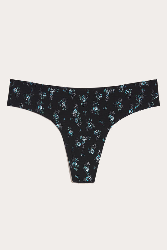 Anna Sui x Knix Boudoir Bouquet Thong, dark background, pattern of white and light blue roses