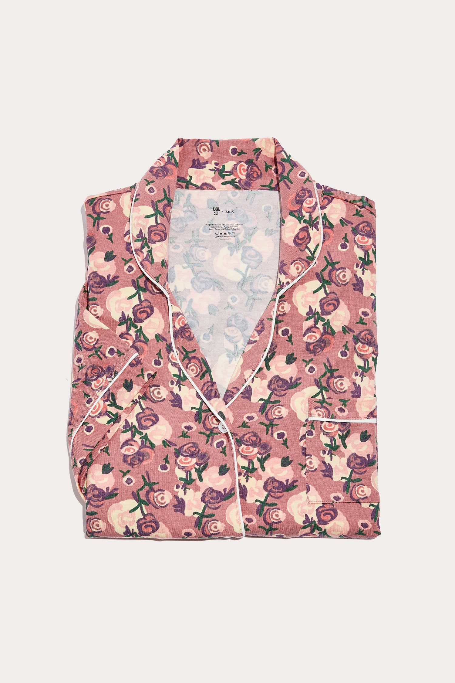 Anna Sui x Knix Rose Bouquet Sleep Top, on a dark rose, pattern of light and darkener pink roses with green 